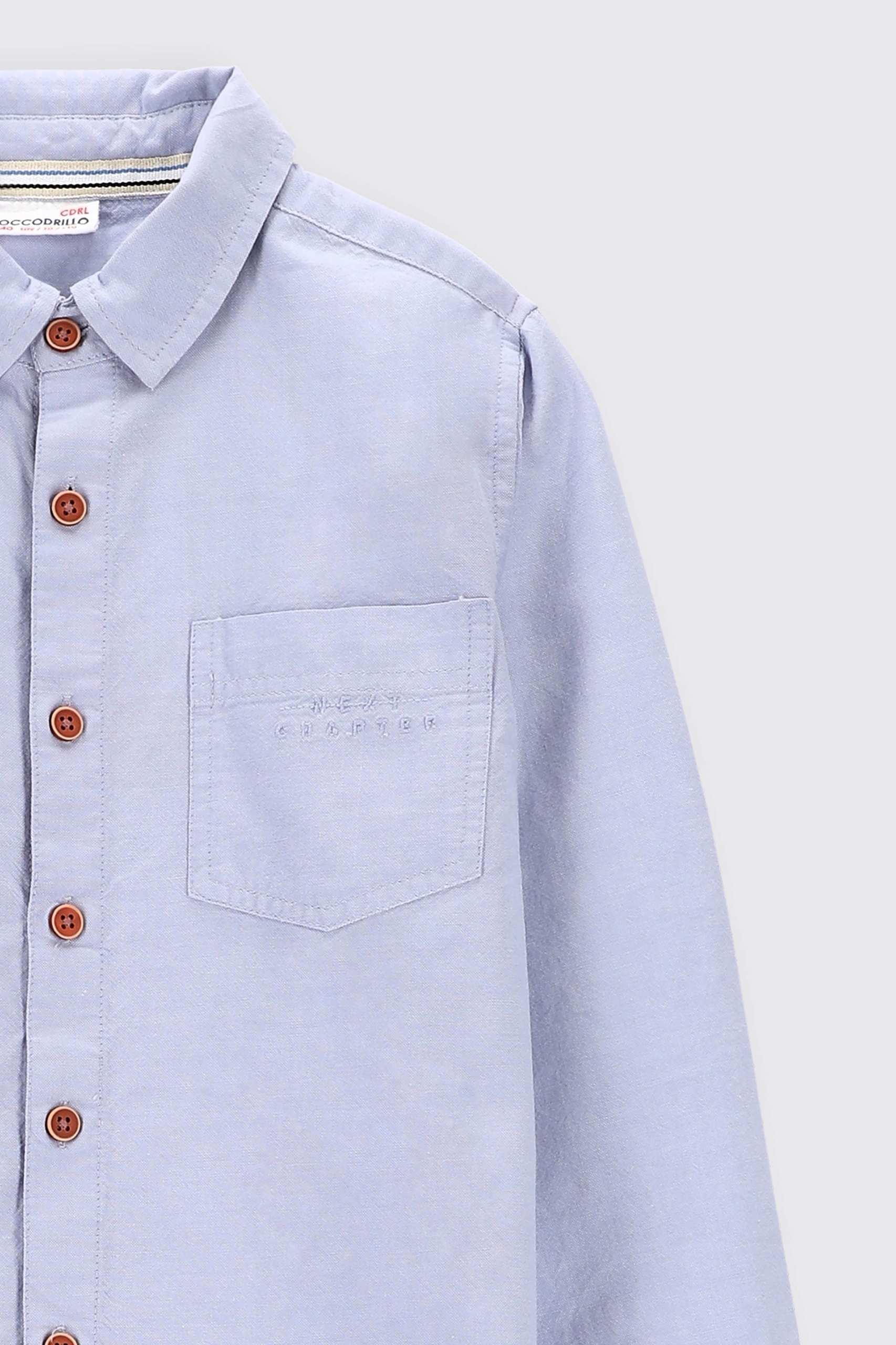 Chłopięca elegancka koszula niebieska 110 Coccodrillo Cechy dodatkowe kieszeń