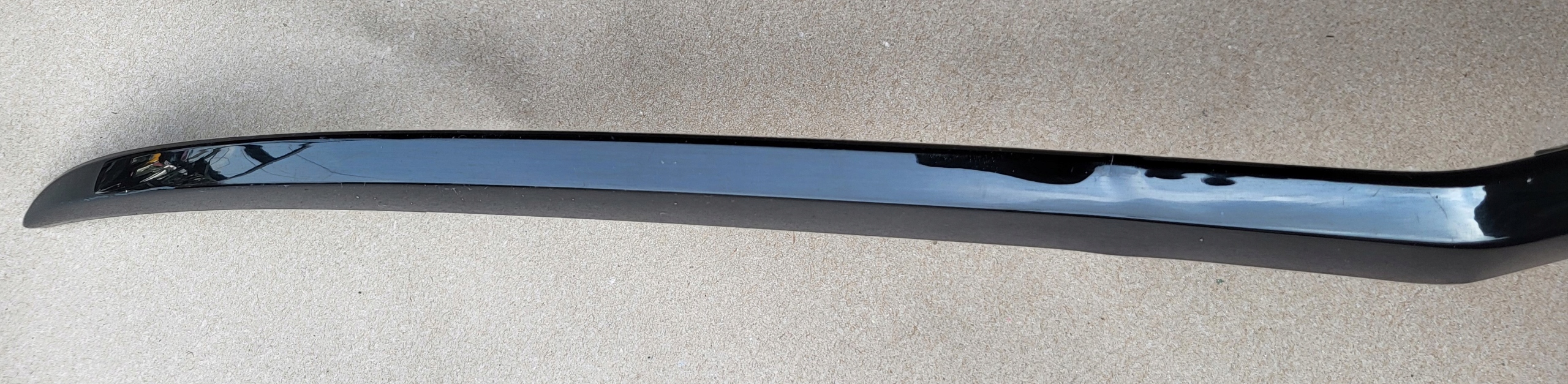 moulding of a bumper cap left front black PIANO VW T-ROC 2GA OE