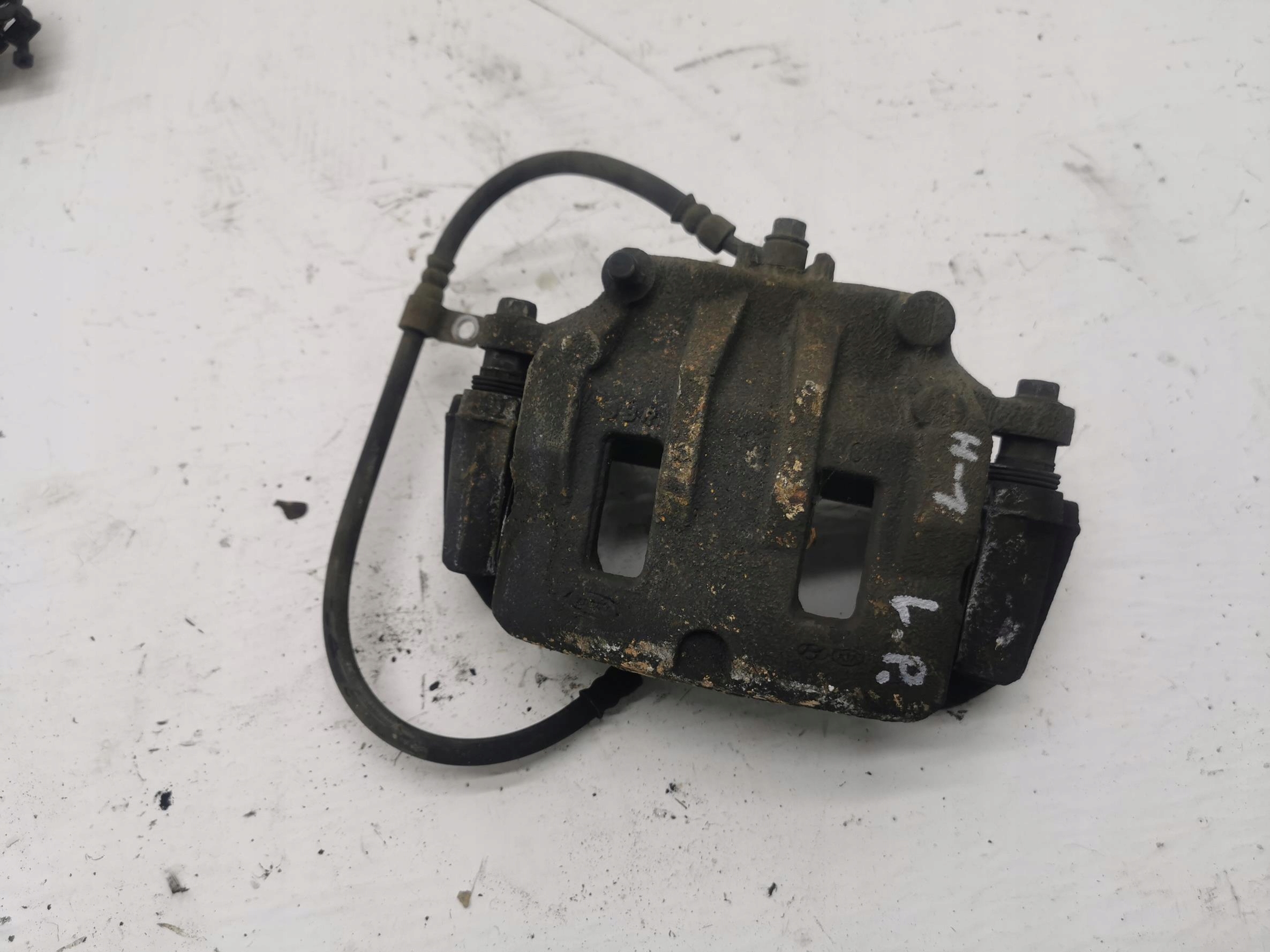 caliper left front HYUNDAI H-1 II LIFT 2.5 CRDi