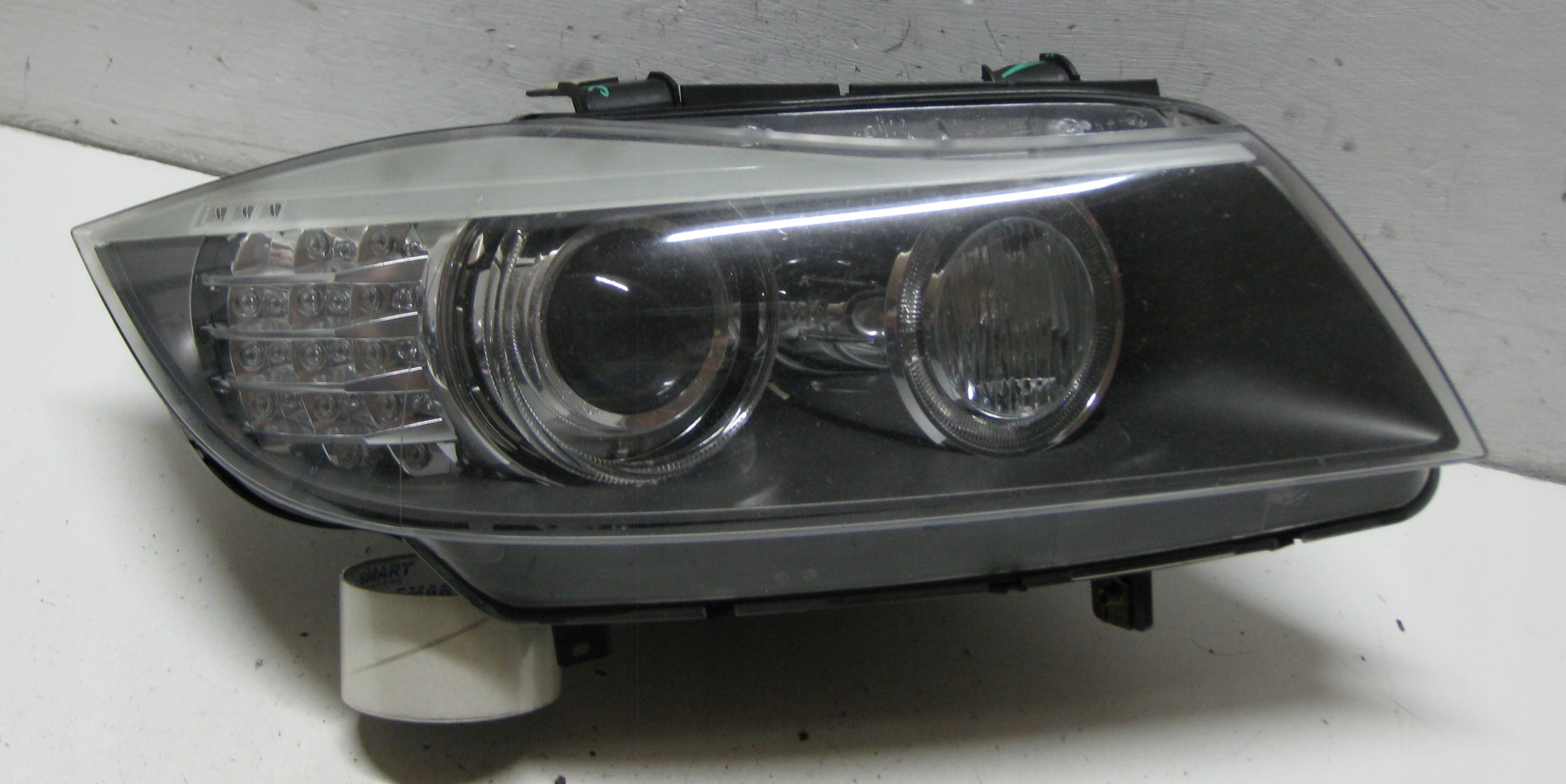 BMW E91 2.0 D 09R light right front XENON 7202590