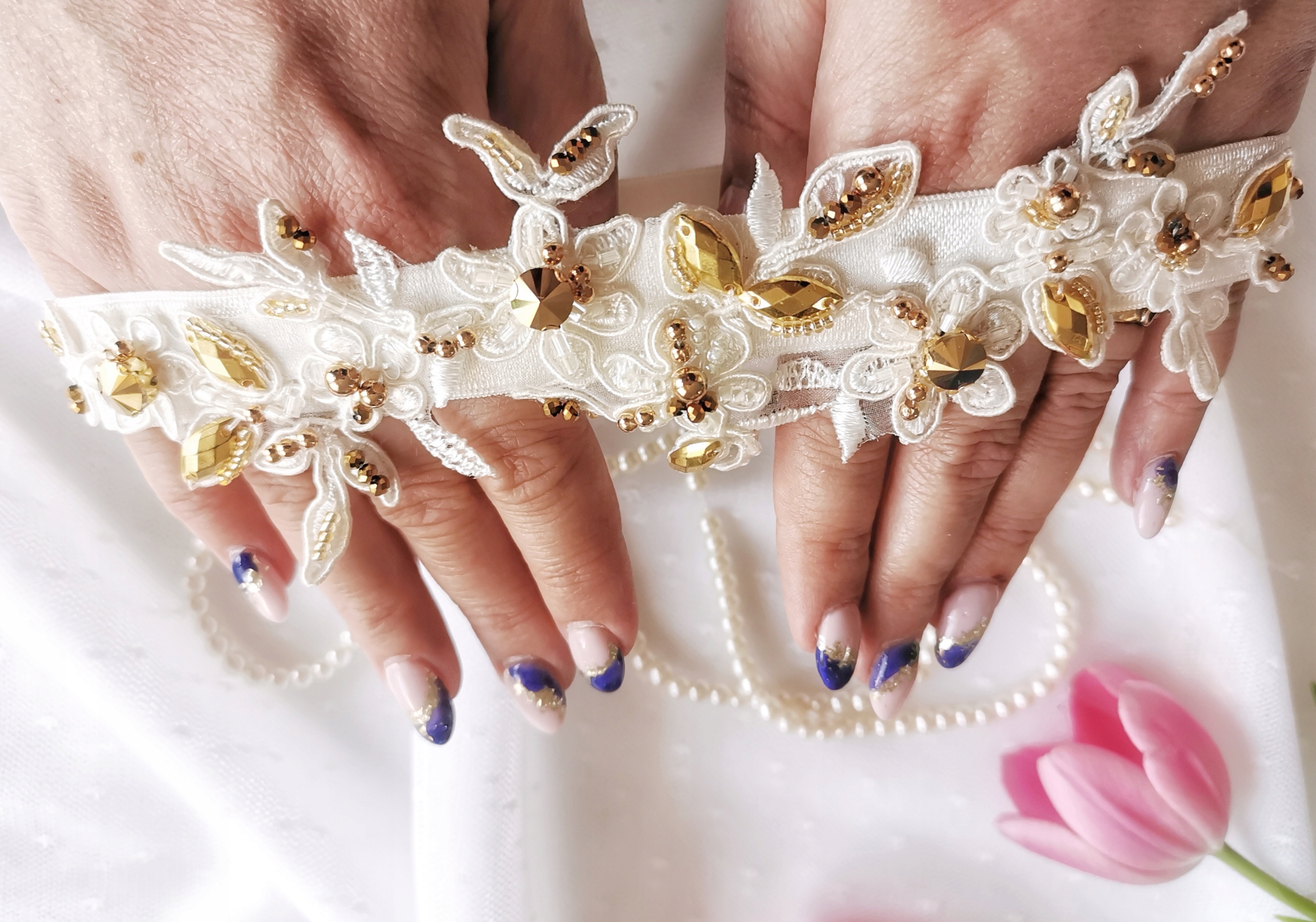 

Podwiązka ślubna wymiar M25 glamur złoty