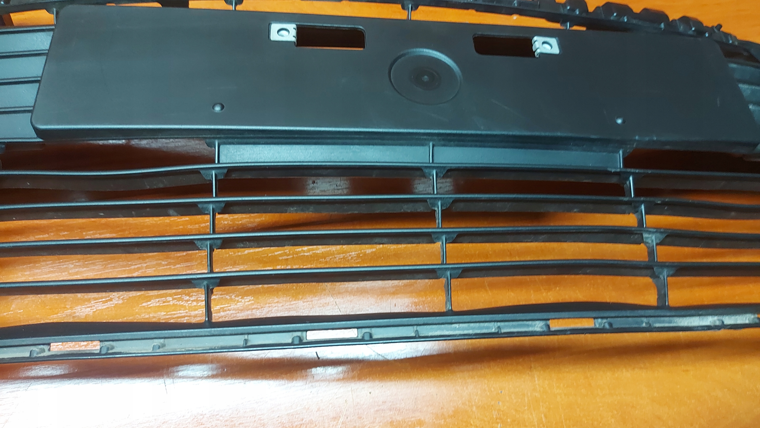grid of a bumper central front front PDC TOYOTA COROLLA E21 sedan 19