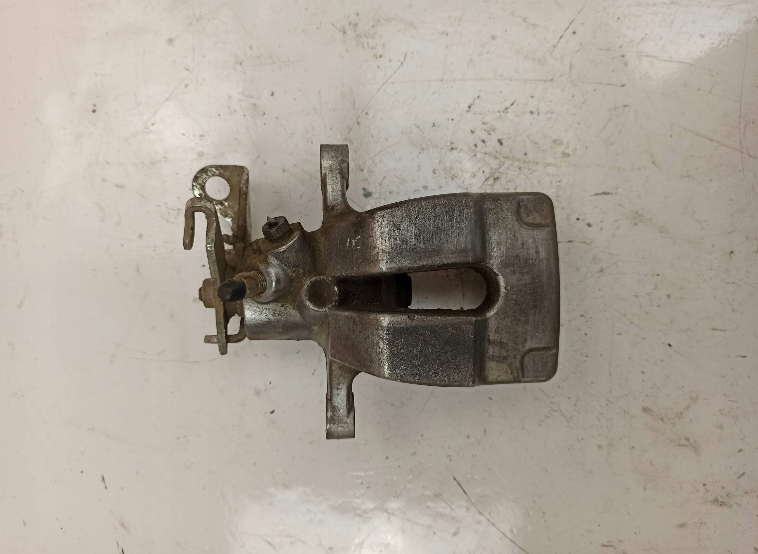 ZACISK HAMULCA PRAWY TYŁ RENAULT MEGANE