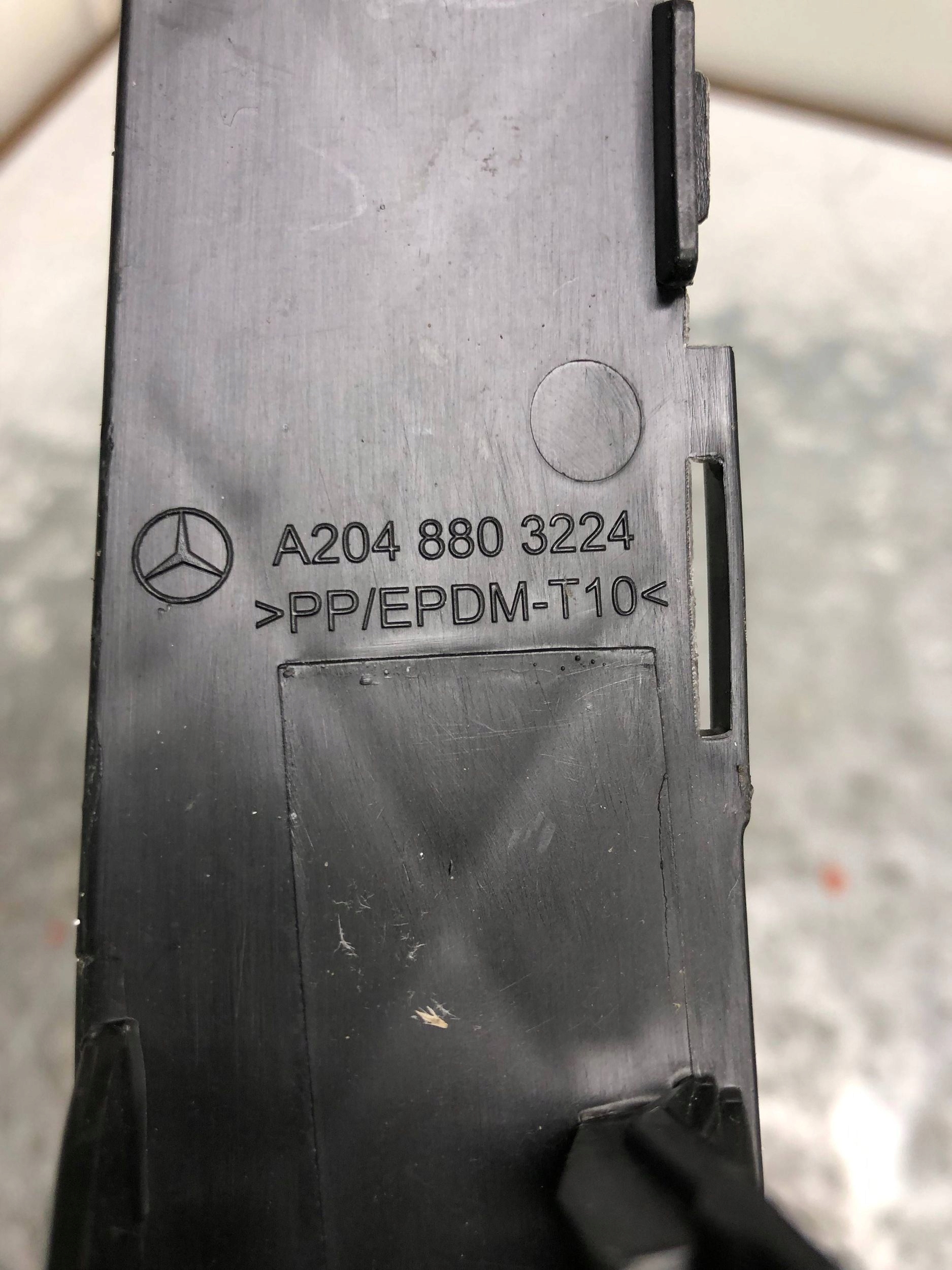 grid of a bumper left front MERCEDES W204 A2048803224