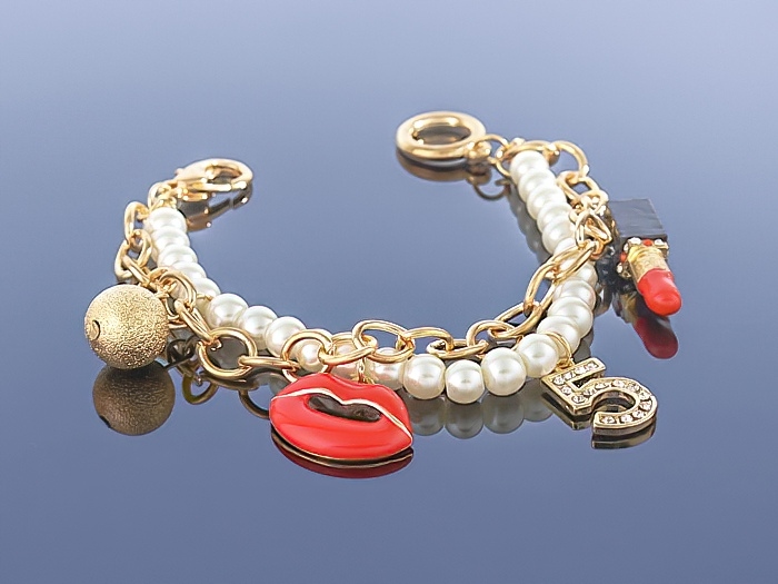 Złota bransoletka Charms