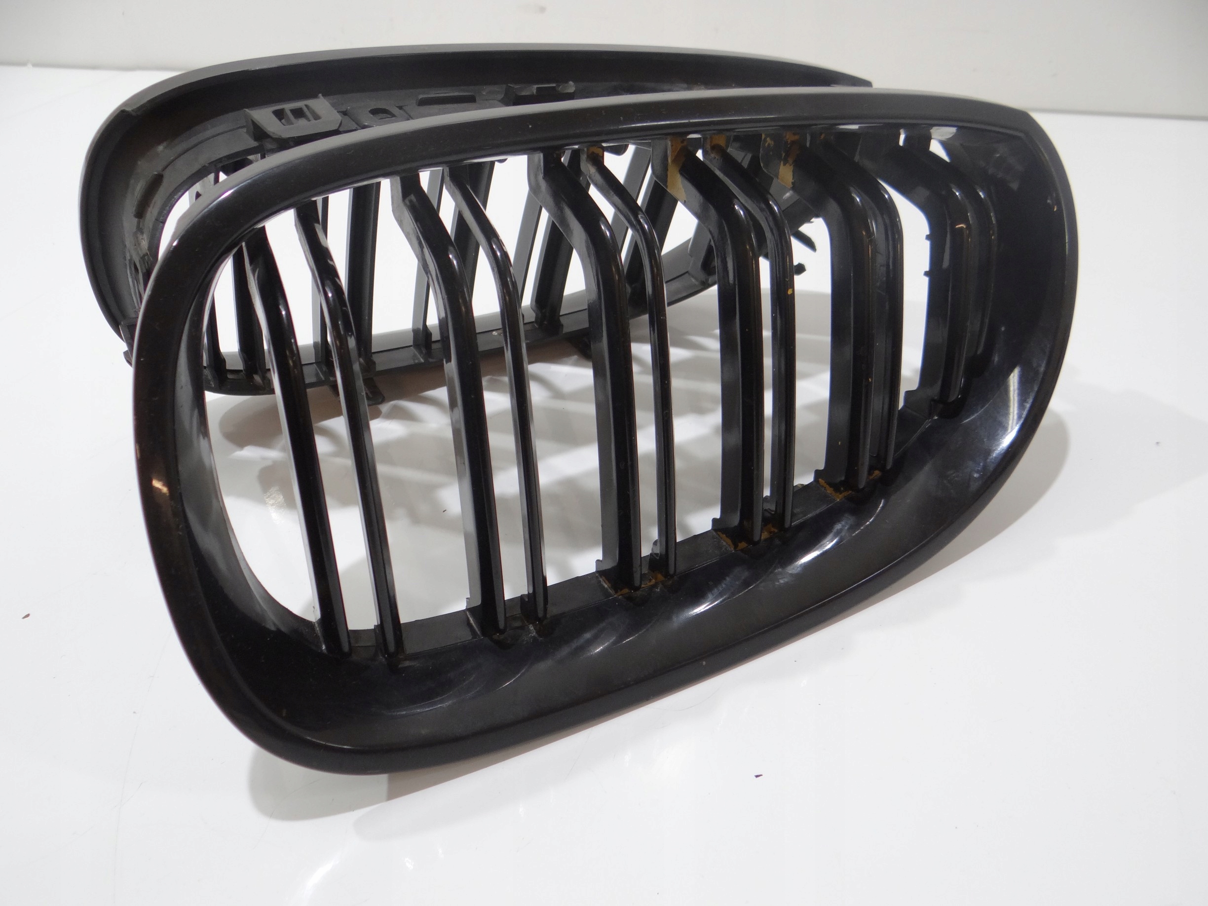 hűtőrács hip pack eleje bal BMW E60 E61 (4273389)