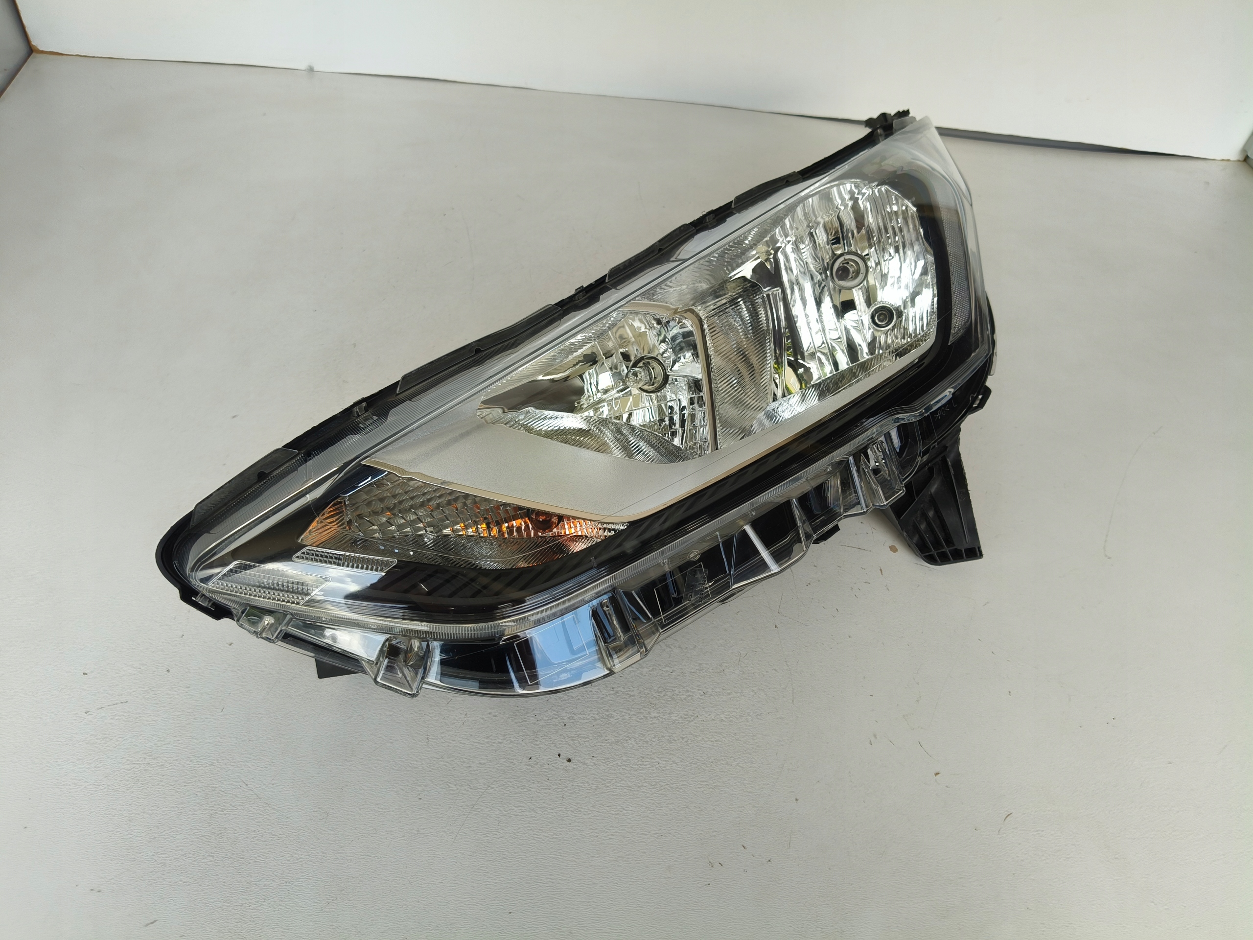 light left REFLEKTOR FORD TRANSIT CONNECT 18- LIFT