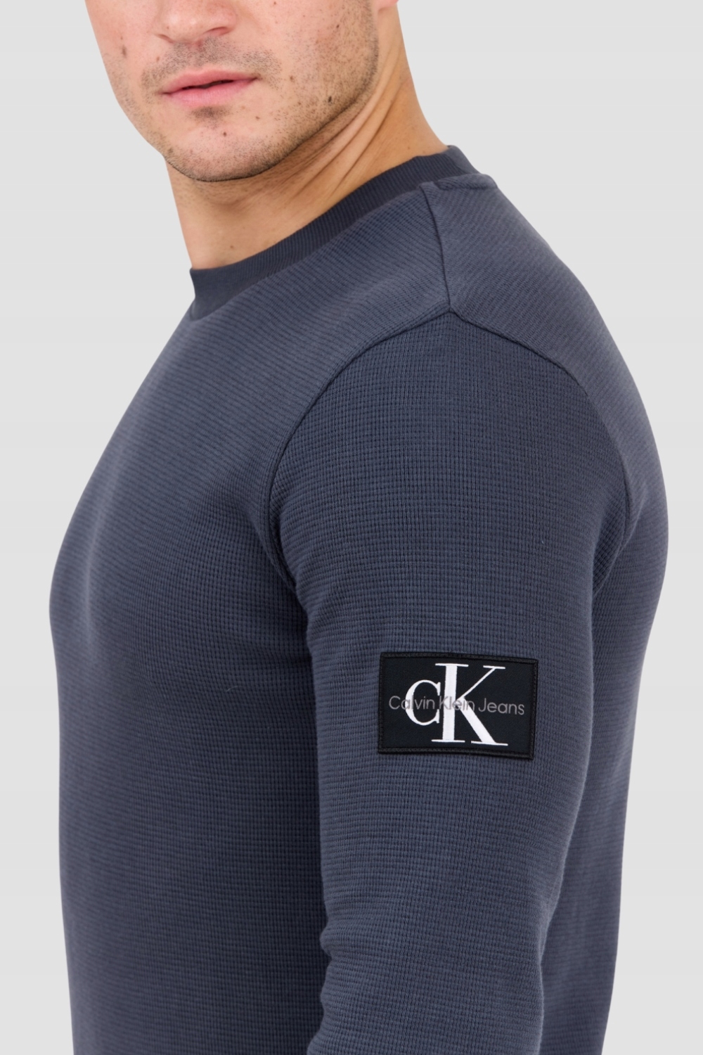 Pánské šedé džíny mikina Calvin Klein velikost M