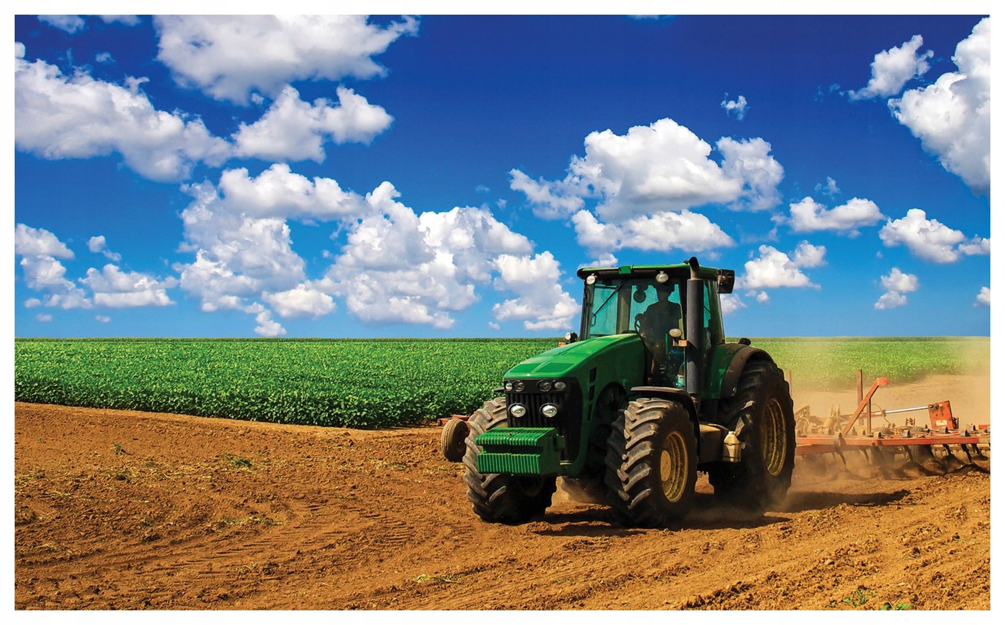 Fototapeta Traktor na poli venkovská krajina modrá obloha 312x219 lepidlo
