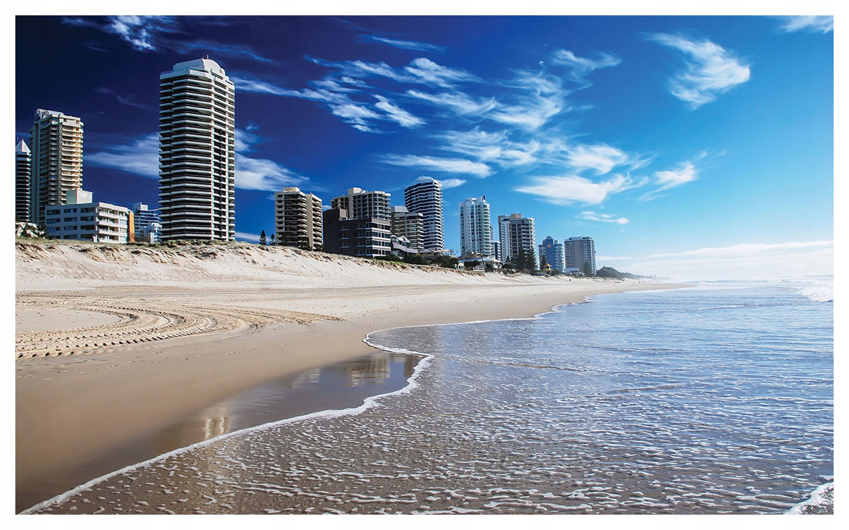 Fototapeta Pláž Oceán a mesto moderný štýl 416x254 do obývačky lepidlo