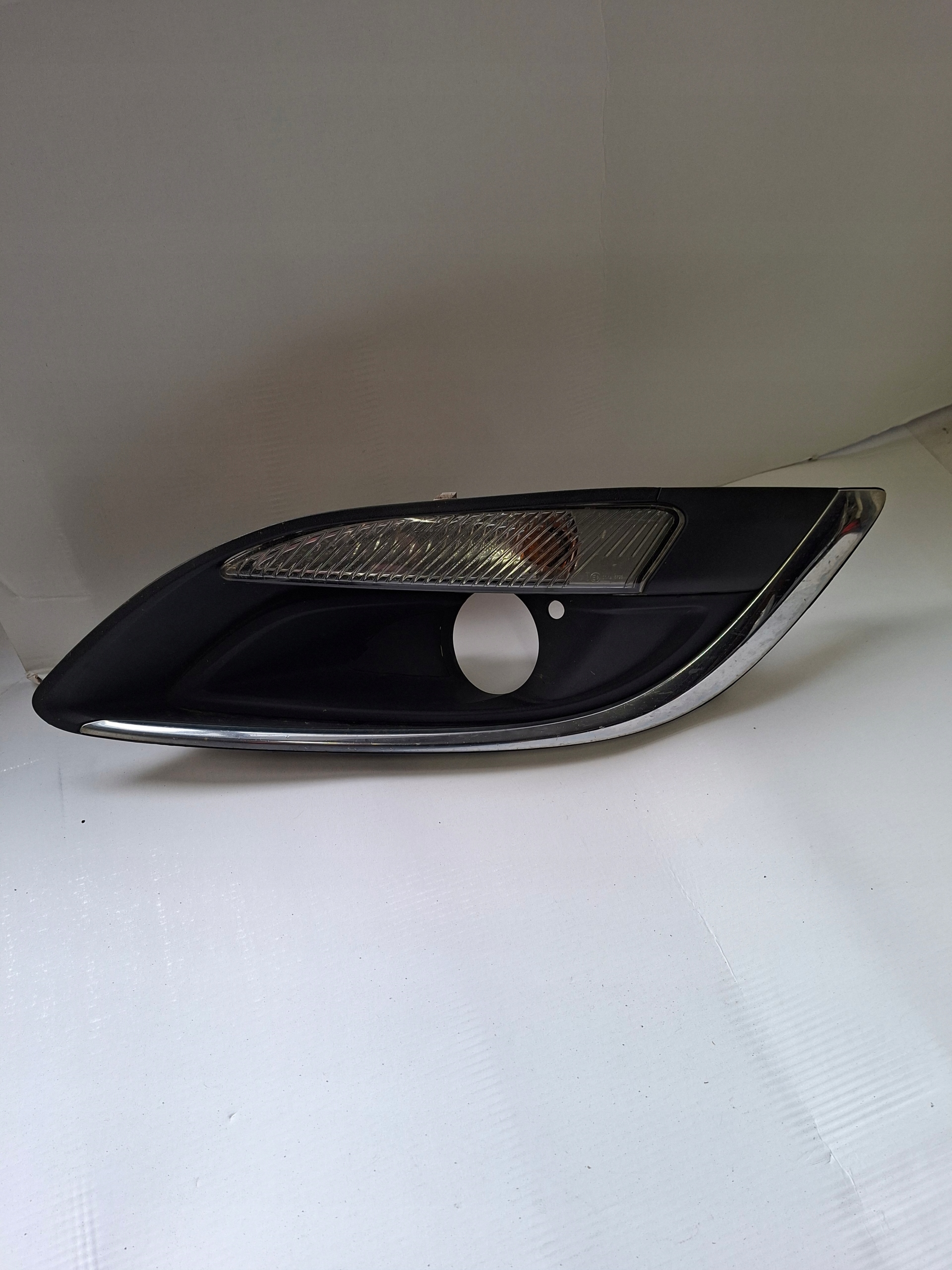 grid of a bumper left indicator OPEL ASTRA IV 13368708