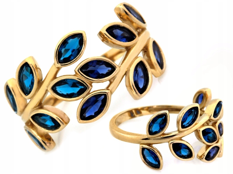 Široký zlatý prstýnek 585 s větvička , lesklým topazem a safírem r23