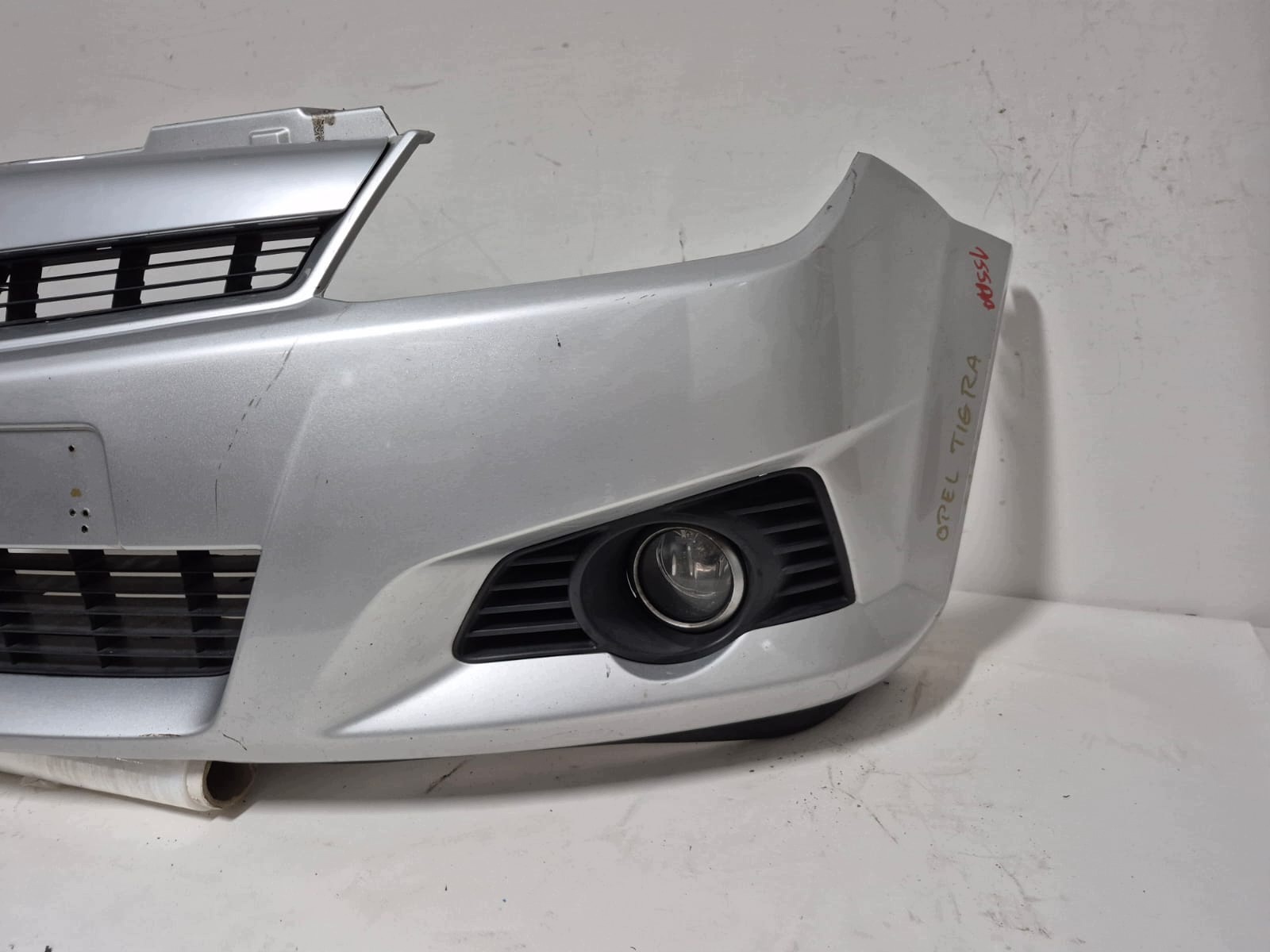 OPEL TIGRA B 04- bumper front front grill grid LAK.Z157 96162173