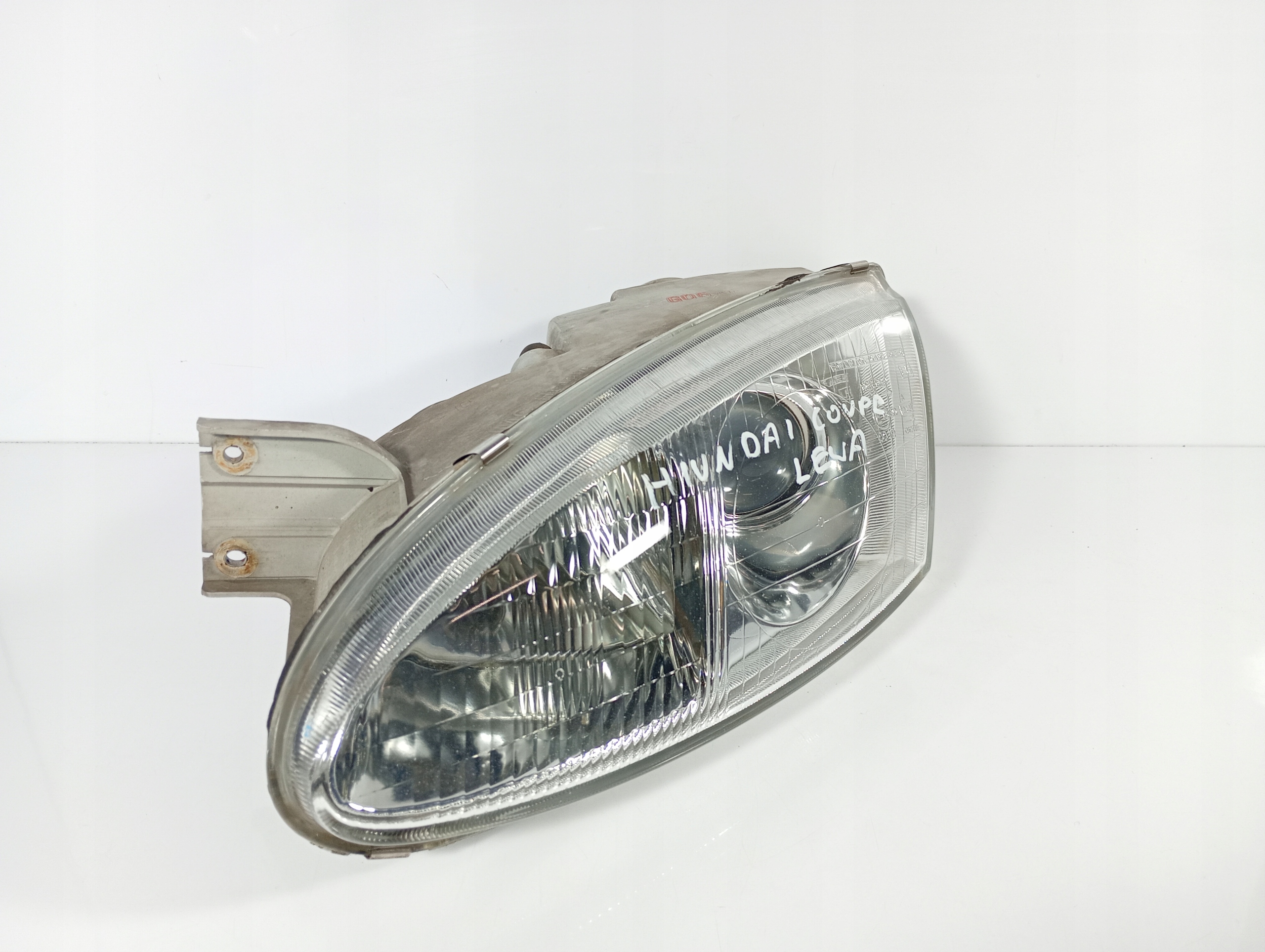 Hyundai Coupe 2 96-01 REFLEKTOR light left front front OE 1010495