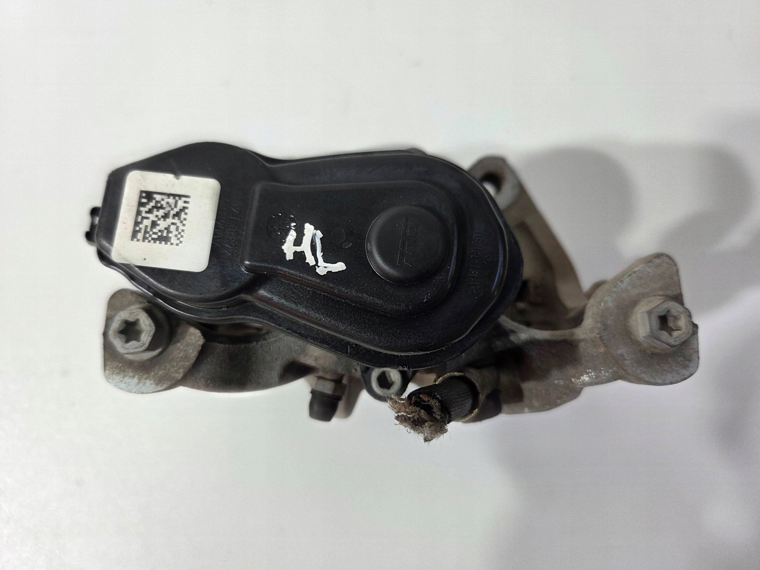Toyota Corolla E210 E21zacisk brake rear left F391C (B701)