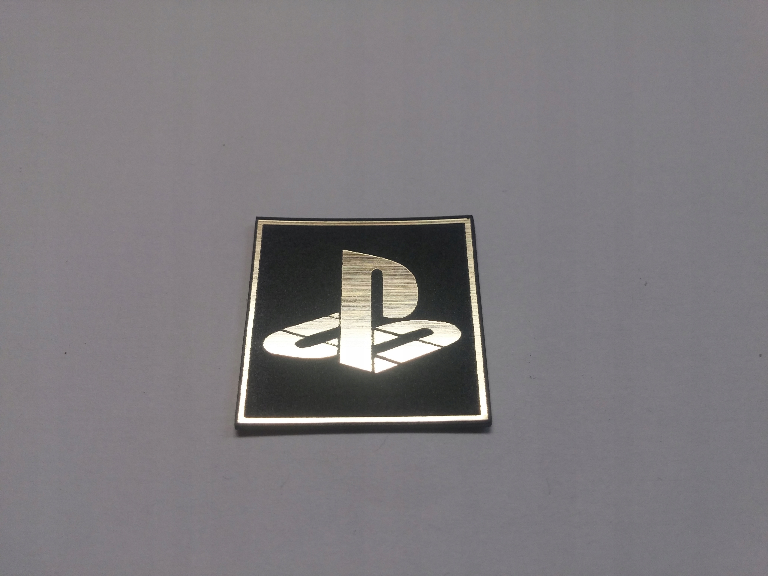 

Playstation naklejka emblemat 29 x 29 mm *złota