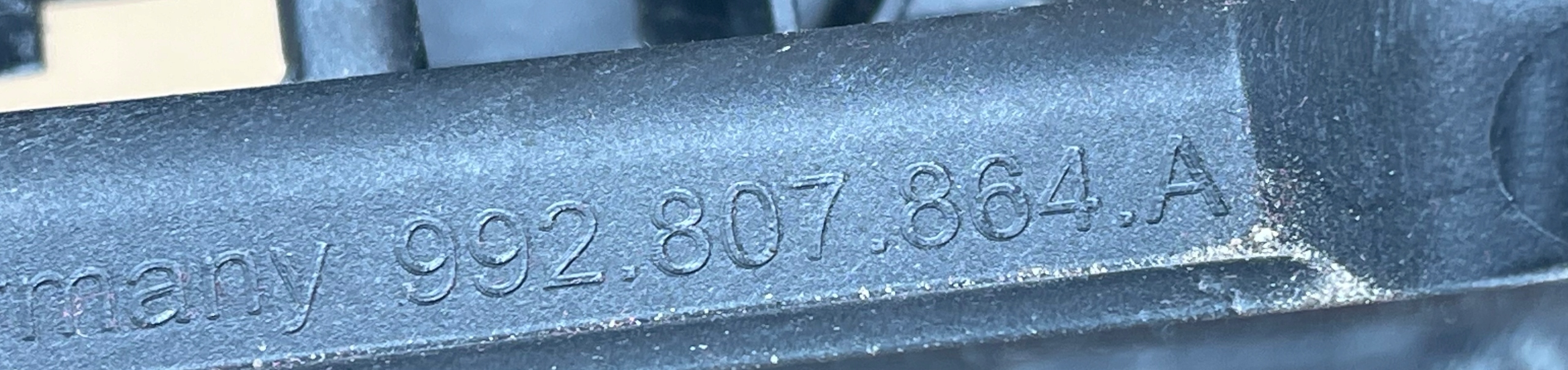 PORSCHE 911 992 Support Support plaque Pare choc Droite Arrière 992807864A