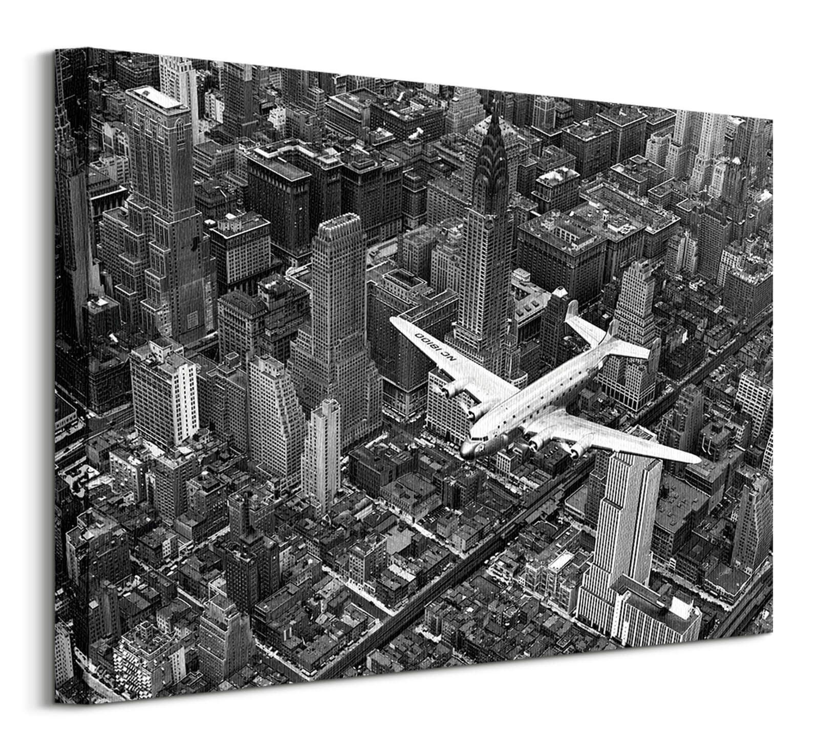 

Obraz na płótnie Samolot nad Manhattanem 50x40 cm