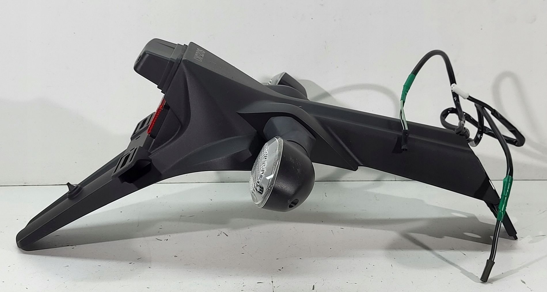 63116-04K0 - Кріплення номерного знака напрямку Suzuki GSX - S GSXS 1000