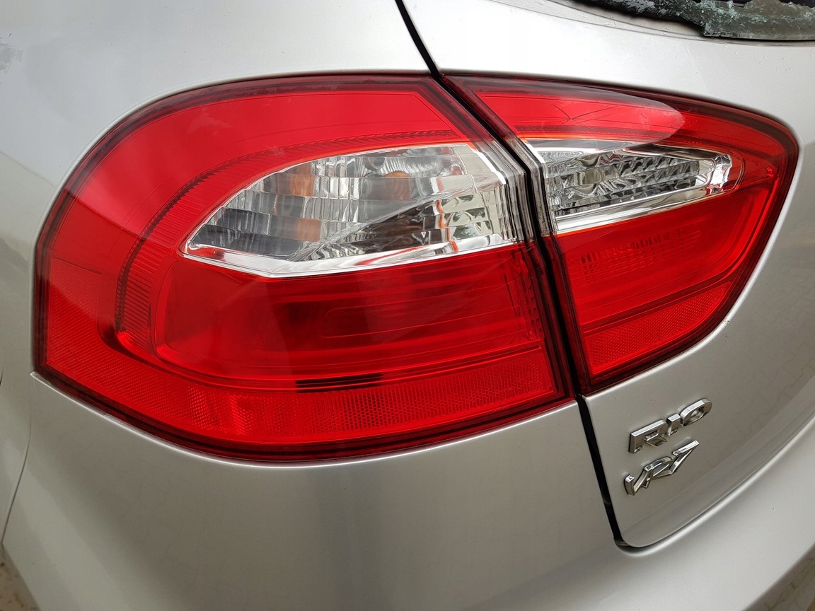 KIA RIO III light left rear part W fender 2011