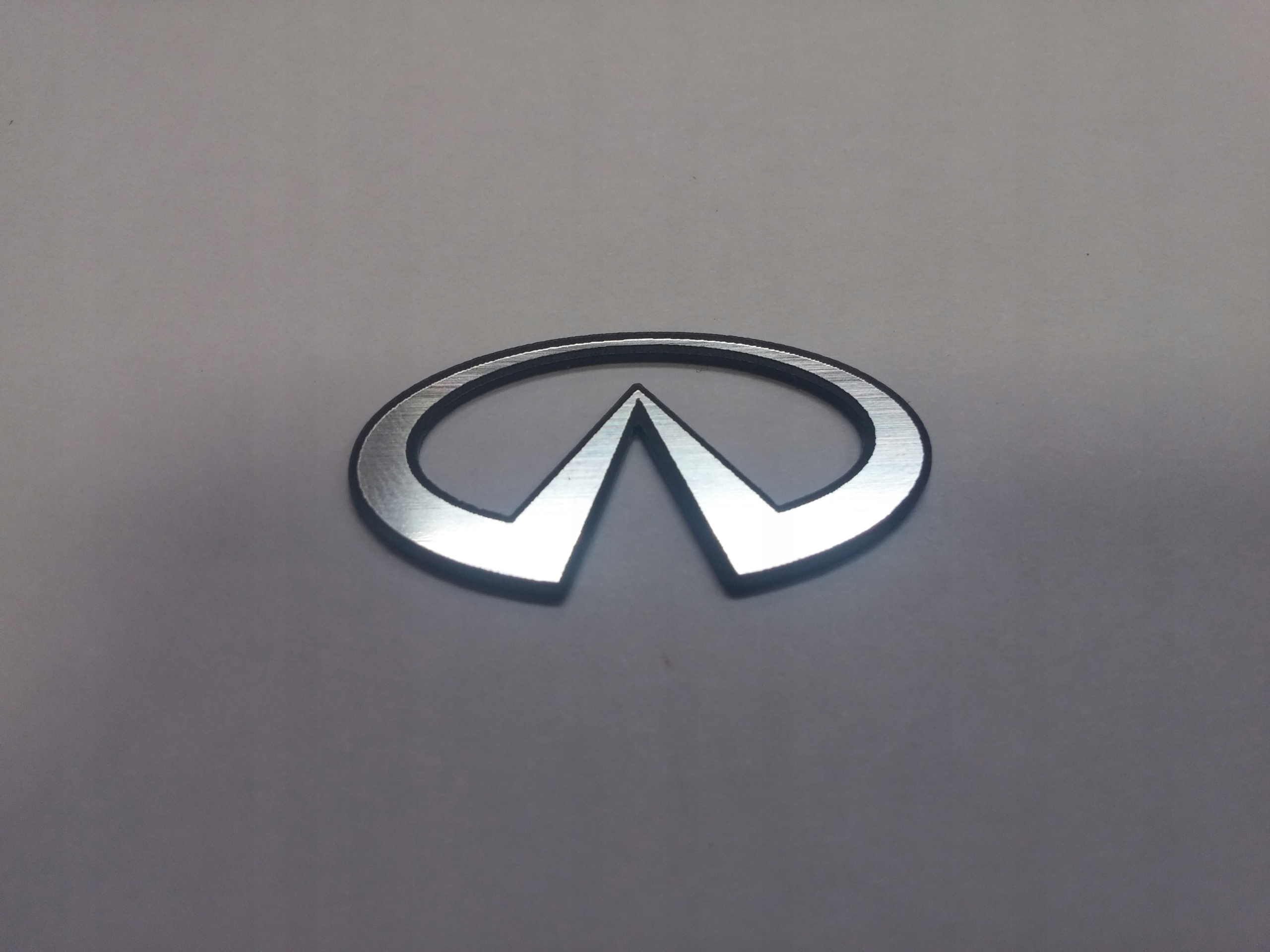 

Infinity naklejka emblemat 35 x 18 mm *srebrna