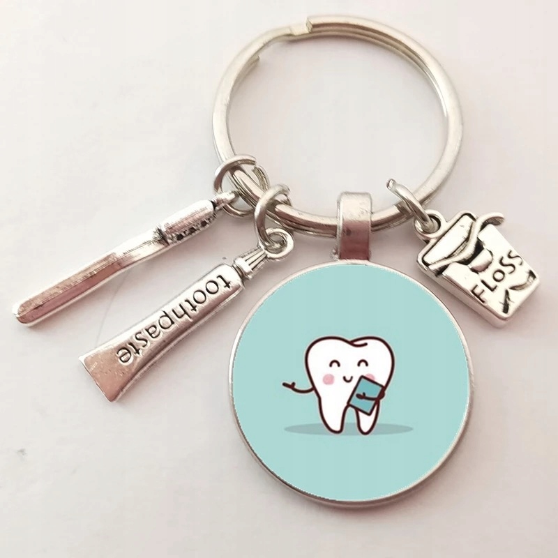

Breloczek dentysta stomatolog ząb prezent 122