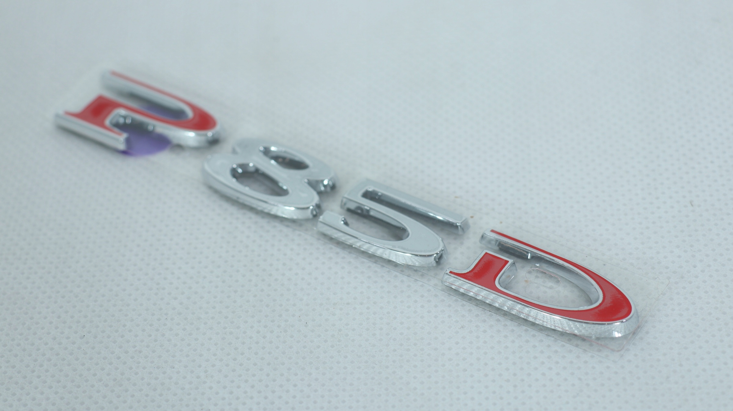 TESLA MODEL S EMBLEMAT NAPIS P85D 1049446-00-A Numer katalogowy części 1049446-00-A