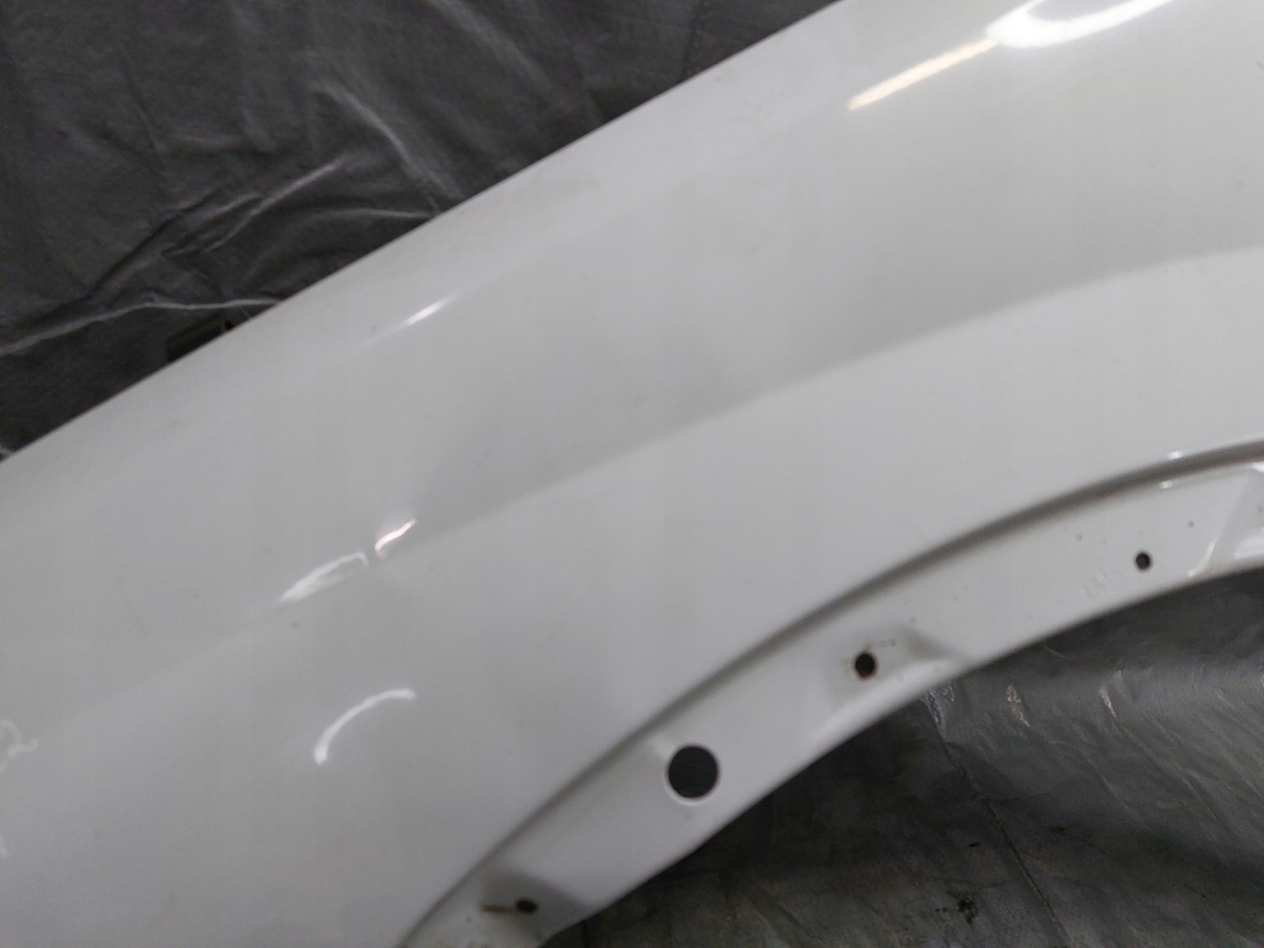 BŁOTNIK LEWY OPEL CORSA C LIFT Producent części Opel OE