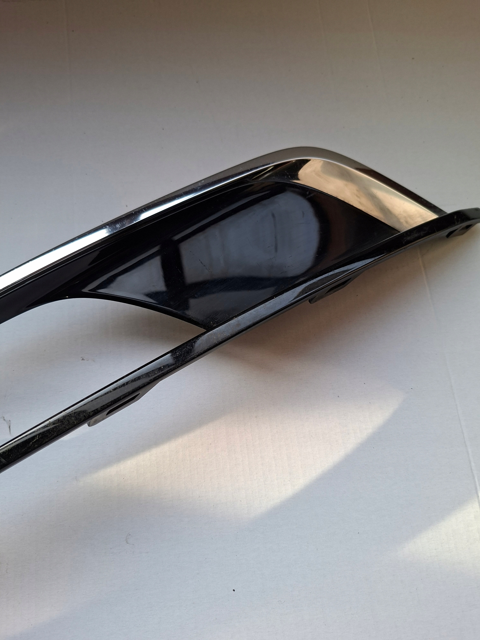 grid frame of a bumper left W PASSAT B7 3AA853211A