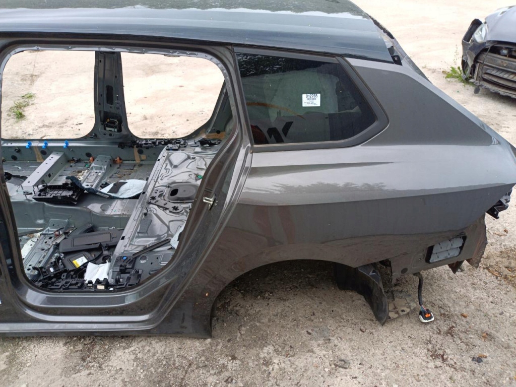 OPEL ASTRA L VI KOMBI ĆWIARTKA BŁOTNIK TYŁ LEWY EVL