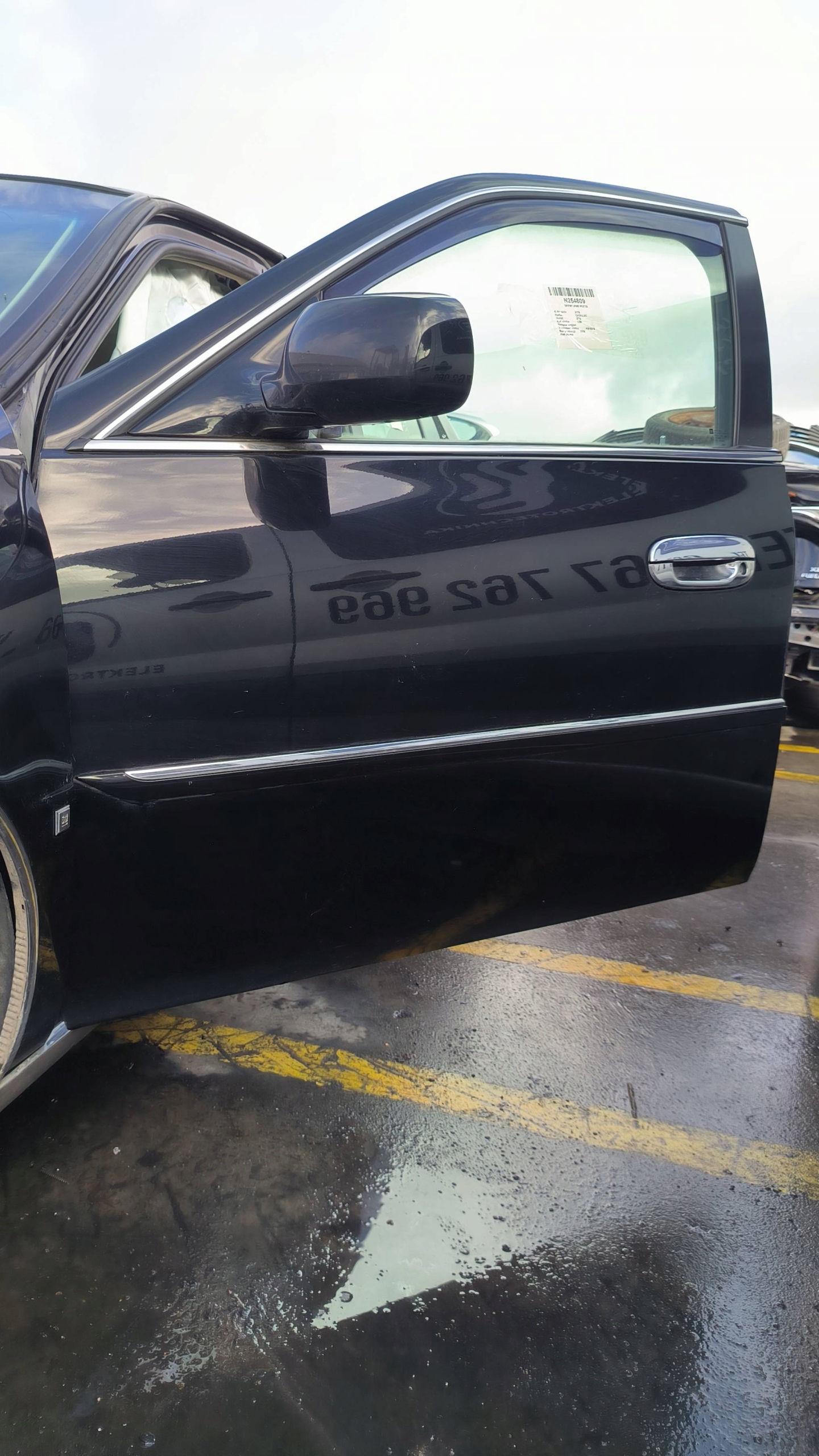 door left front U8555 CADILLAC DTS black,
