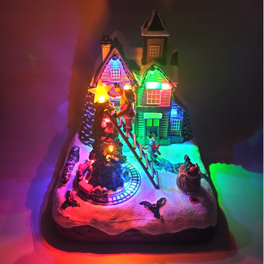 MAGIC VILLAGE ŚWIĄTECZNA WIOSKA MIKOŁAJ NA WYCIĄGU POCIĄG DEKORACJA RUCHOMA Wysokość produktu 22 cm