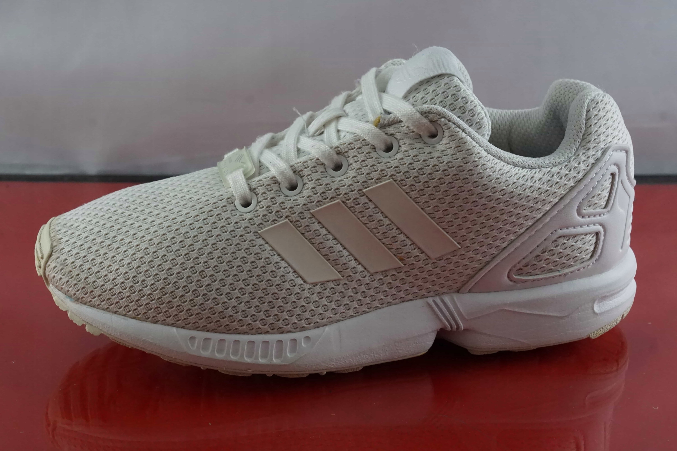 靴 a Buty adidas ZX 100 