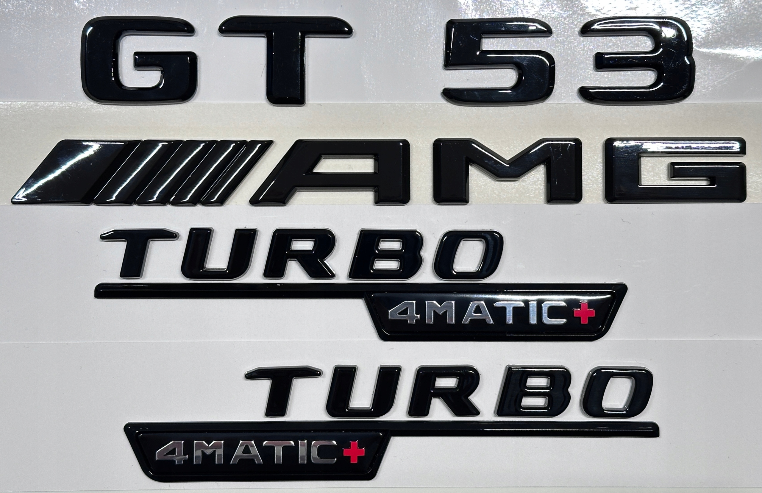 Mercedes Gt 53 Amg Turbo 4MATIC+ emblém značka nápis čierna