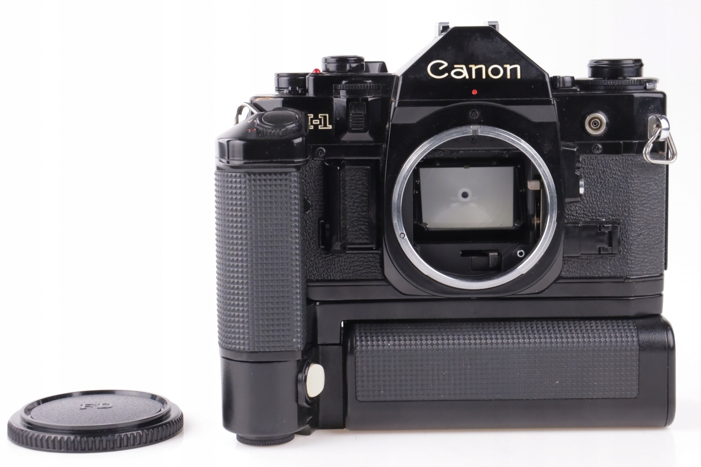 Analogový Canon A-1 body + Motor Drive MA + Battery Pack MA Analogový Canon A-1 body + Motor Drive MA + Battery Pack MA