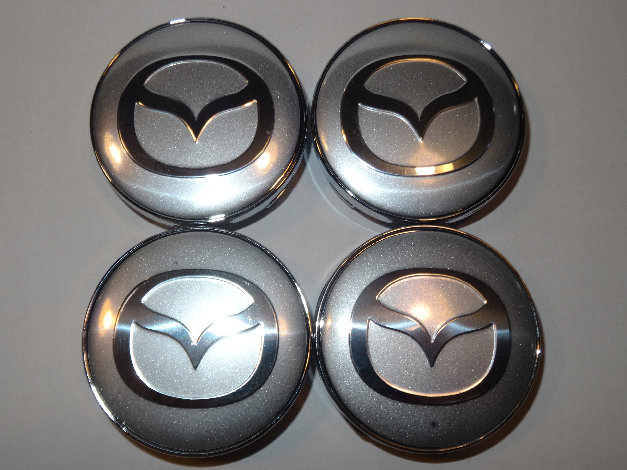 

4x Dekielki Dekle Emblematy na felgi Mazda 60 mm s