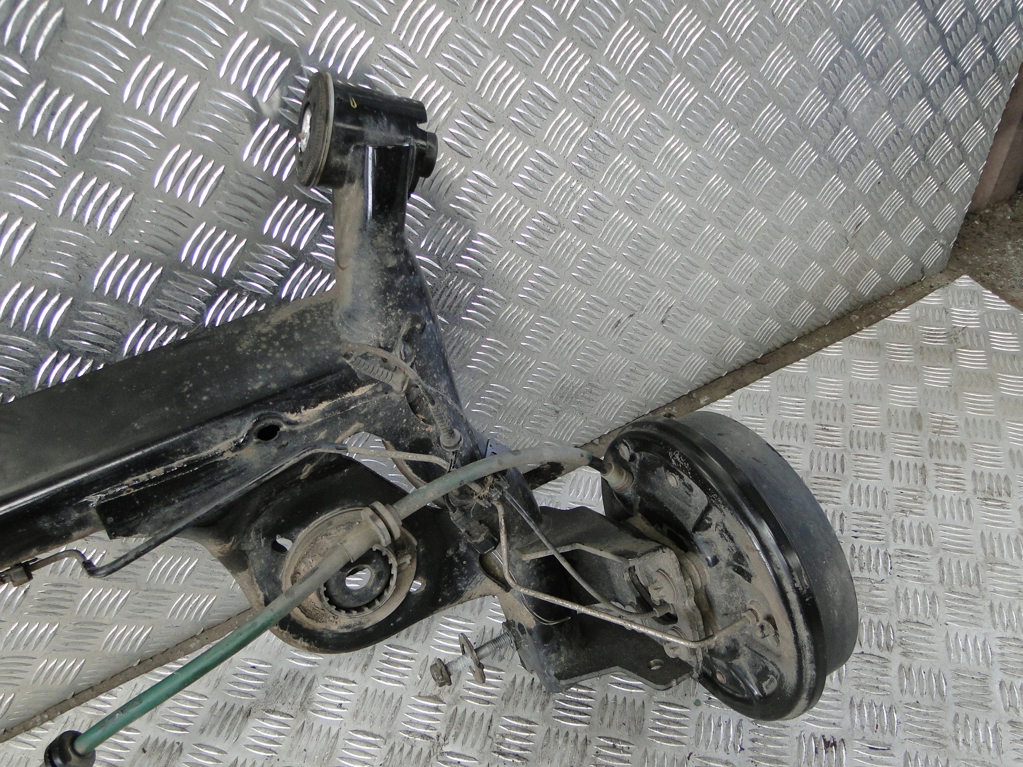 OŚ TYŁ DACIA JOGGER 1.0TCE Producent części Dacia OE