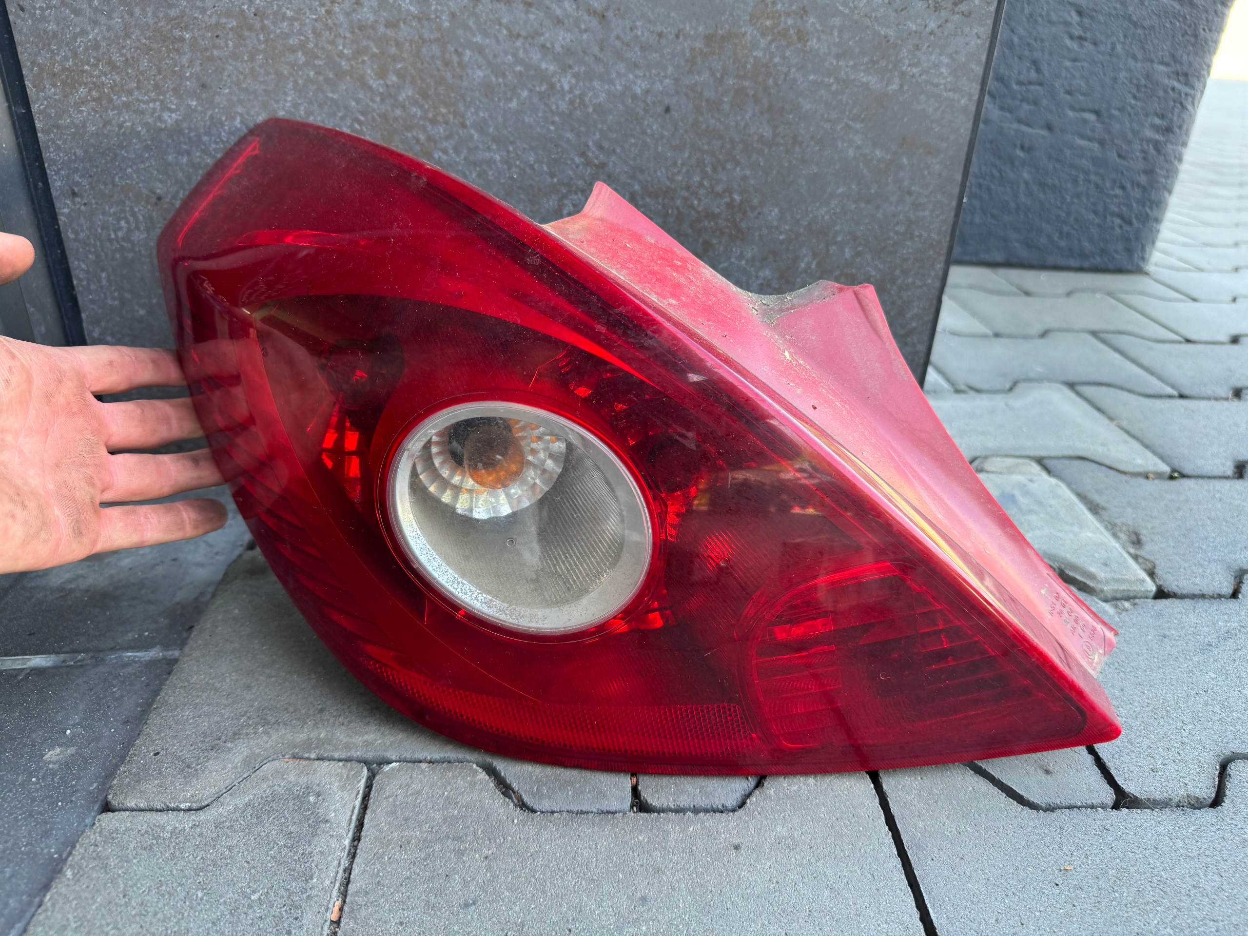 OPEL CORSA D light left rear part 13186350