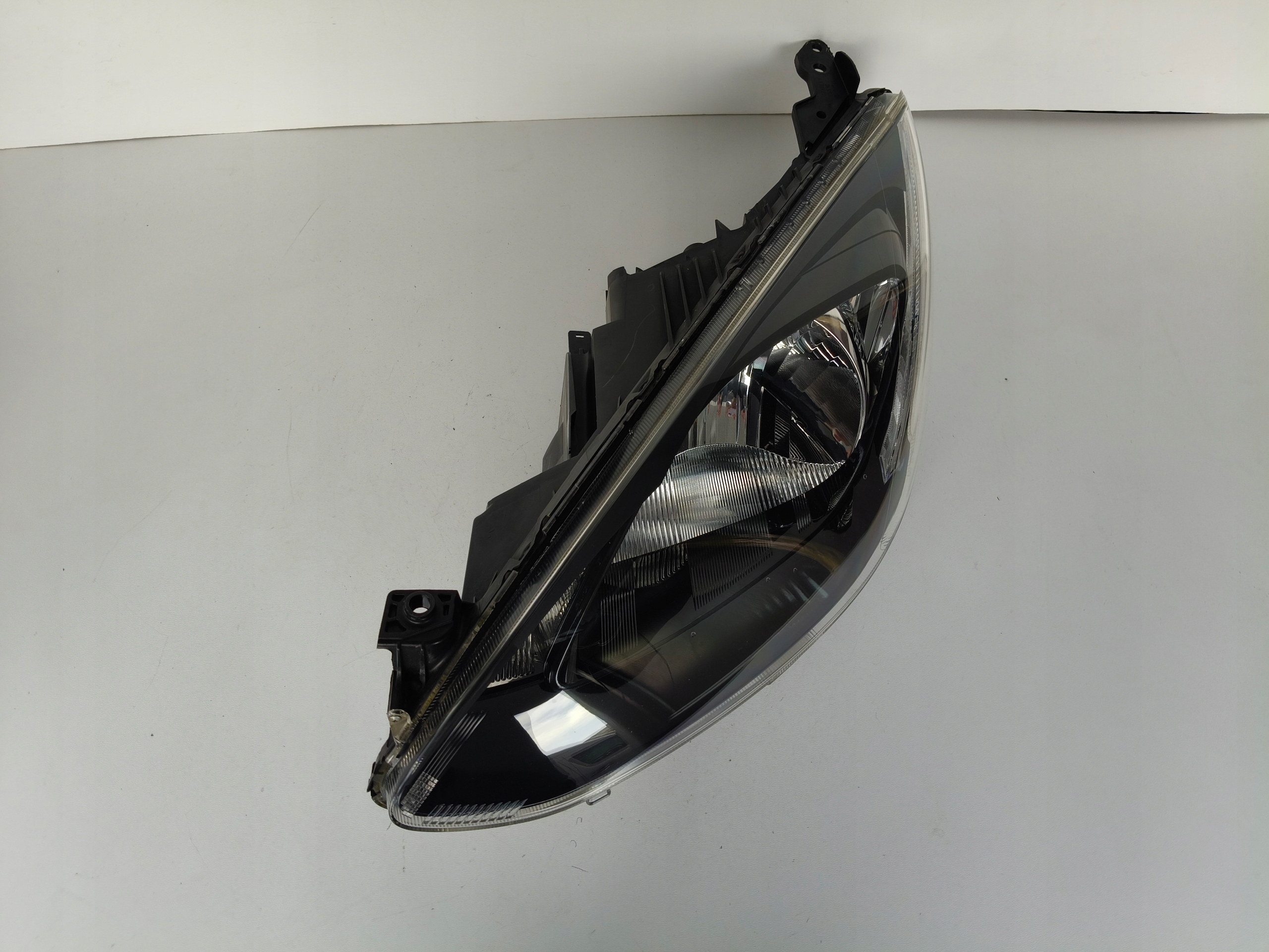 light left REFLEKTOR MAZDA 2 07