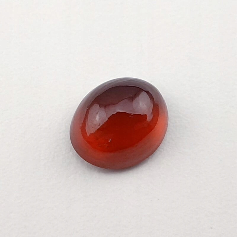 Granat Hessonit kaboszon ~8x7 mm nr 10