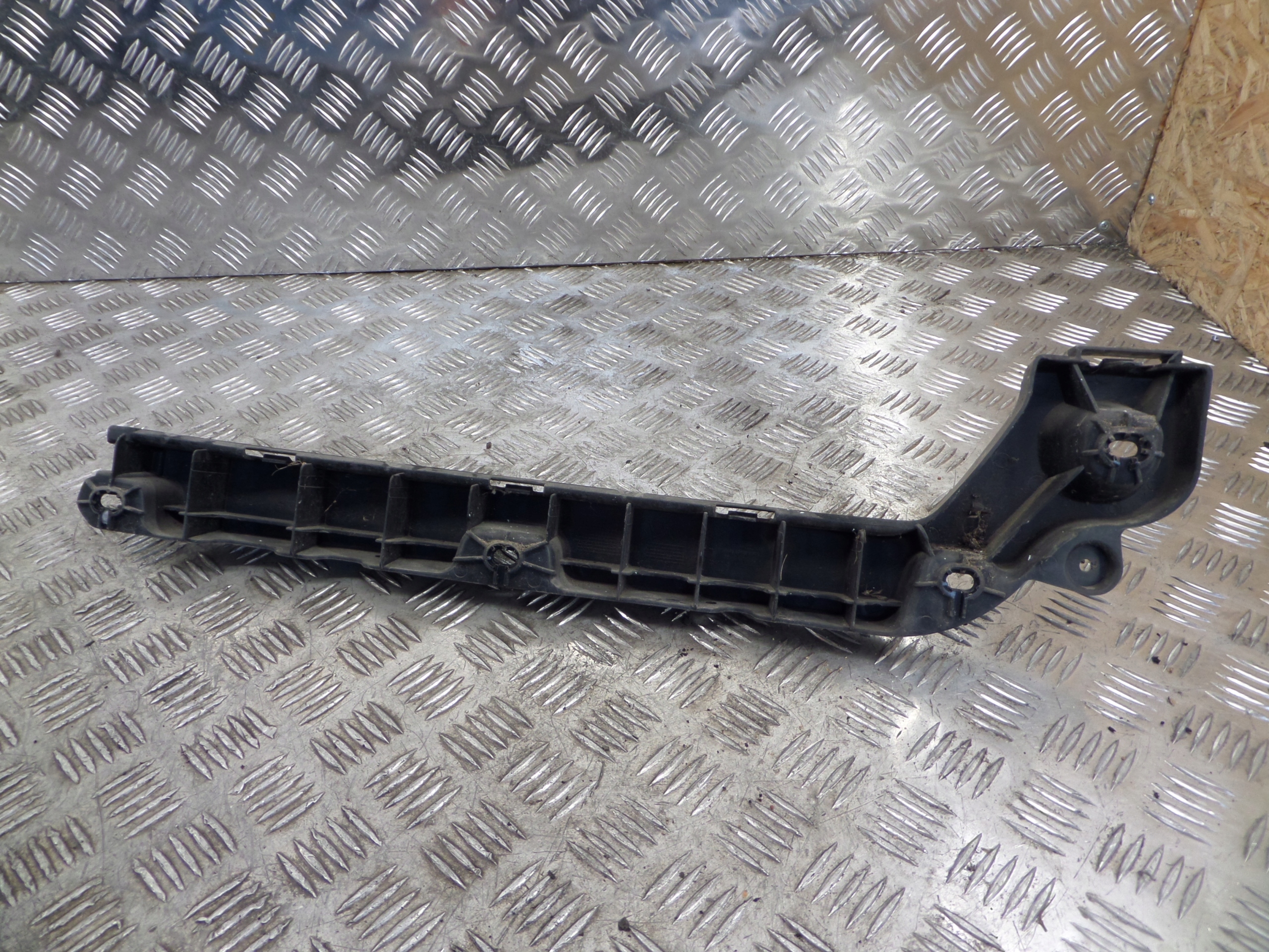 bumper bracket 6V6807863 SKODA FABIA III HATCHBACK left rear original