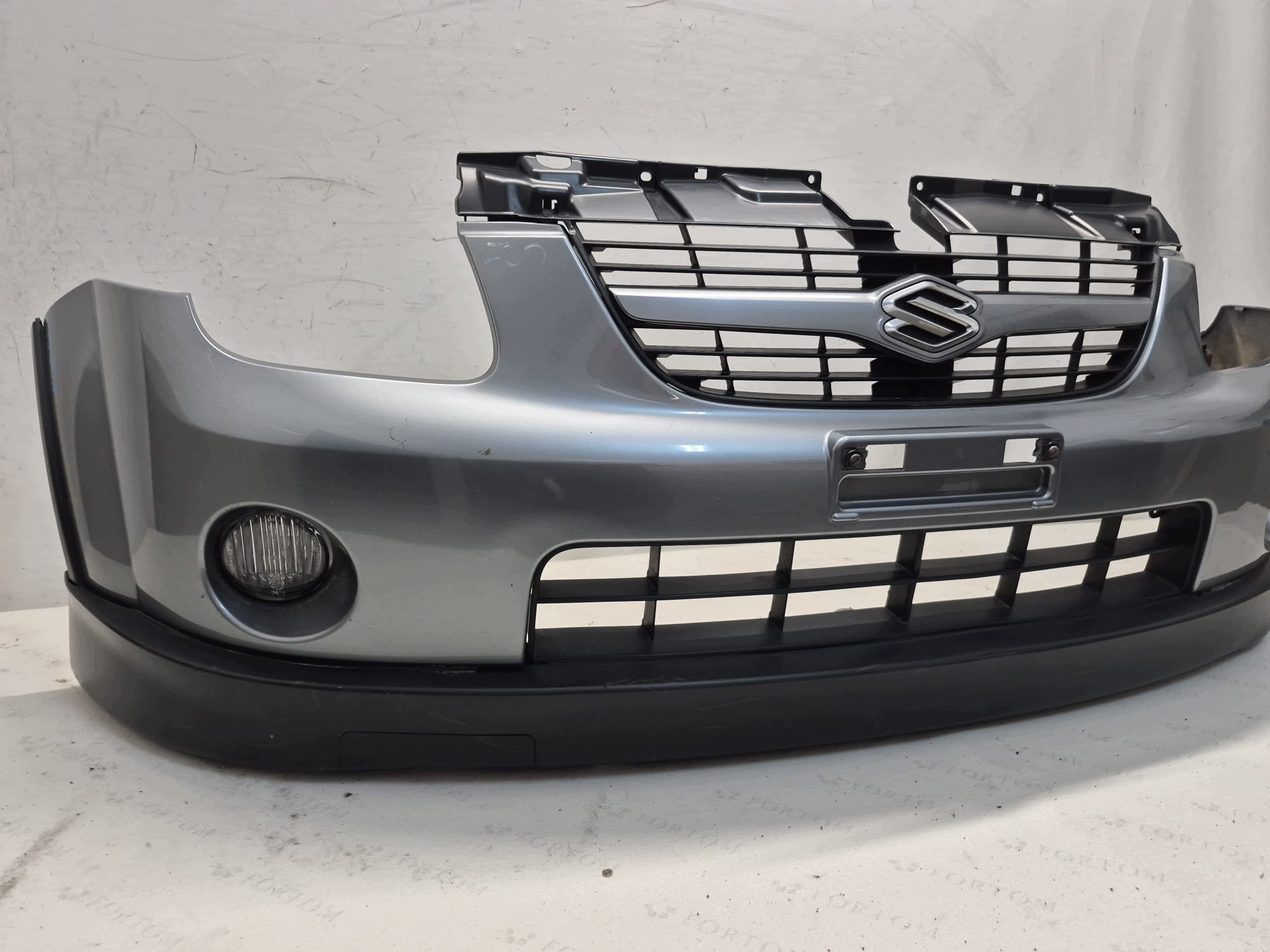 SUZUKI IGNIS II LIFT 03- bumper front front 71711-86G00 LAK.ZCD