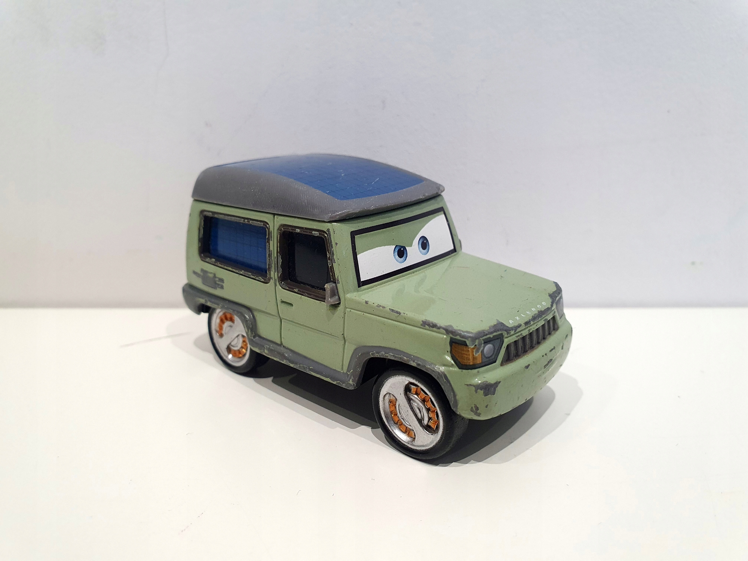 Mattel Disney Pixar Auta Cars Miles Axlerod Baron Rydz DXV45