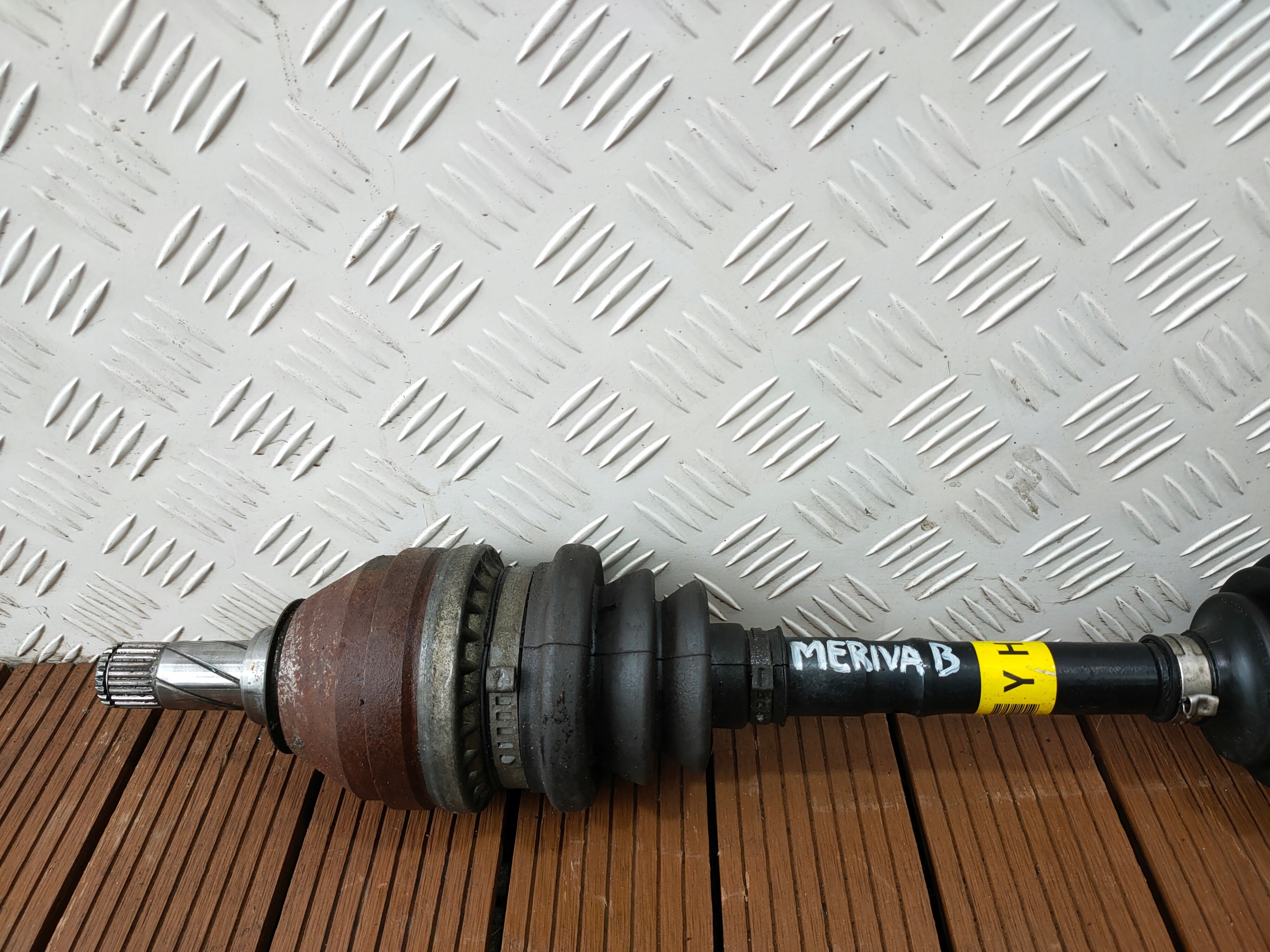 OPEL MERIVA B 10-17 1.4T semi-axis front left short. OE SYMBOL YH