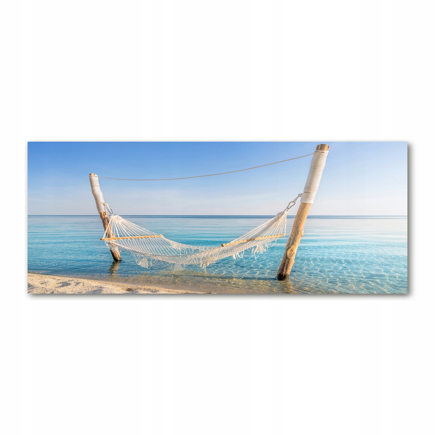 

Foto obraz szkło akryl Hamak nad morzem 125x50 cm