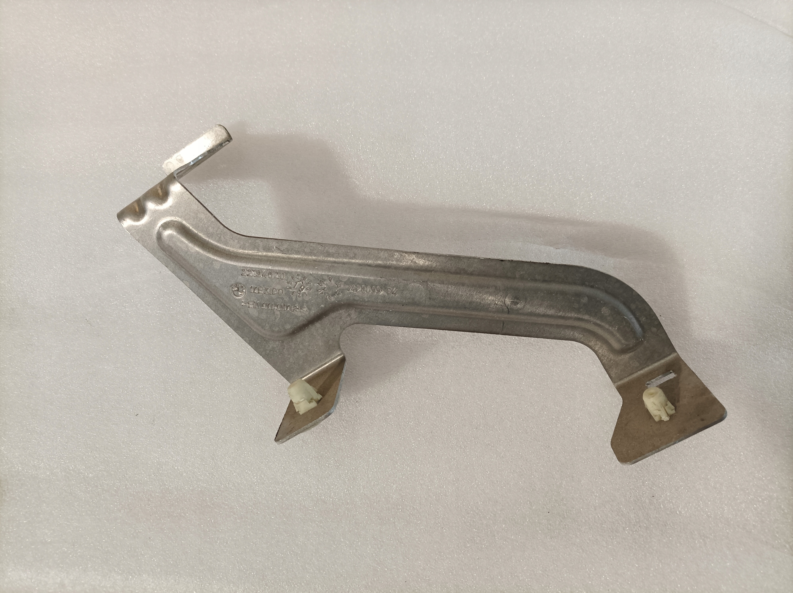 BMW X7 G07 bracket OBUDOWY chassis left 7428099