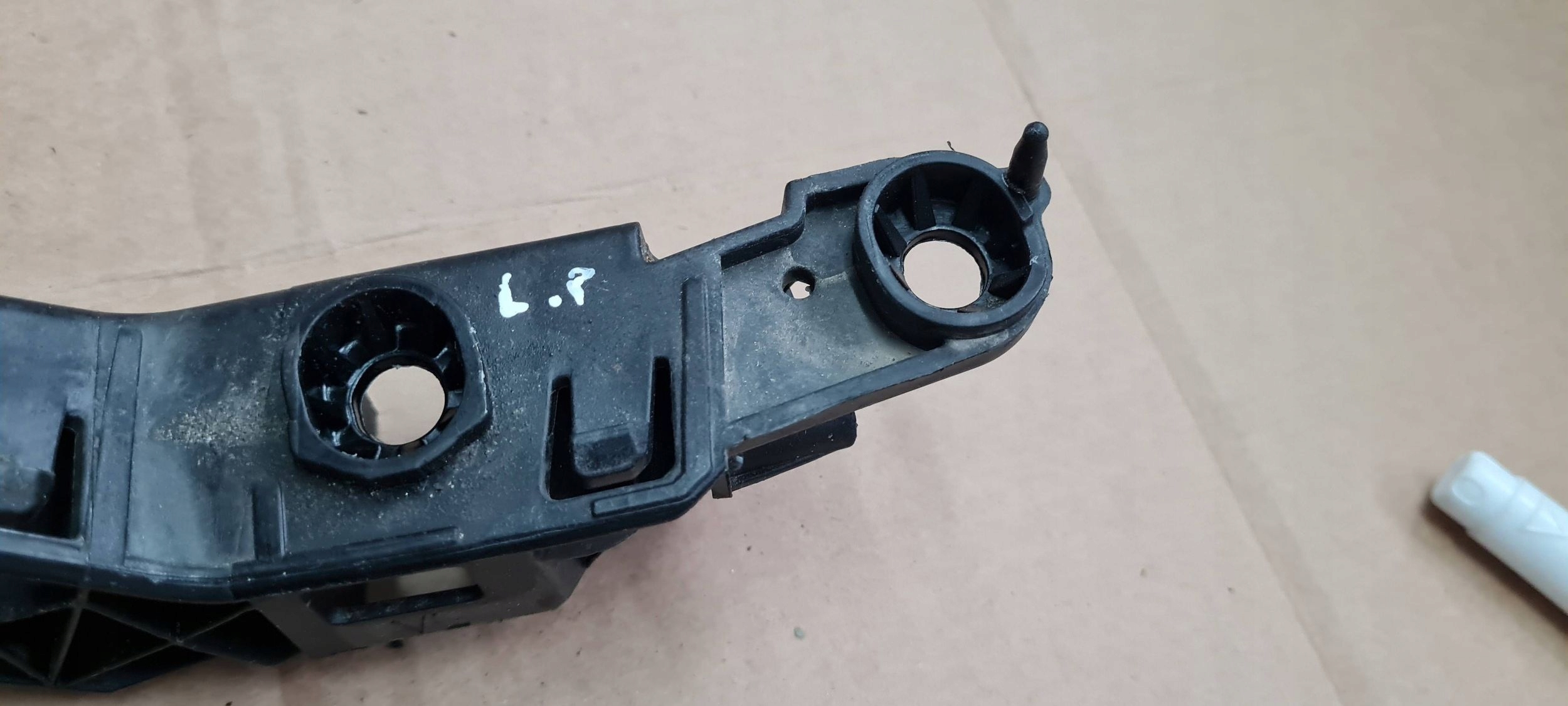 Q3 83A support bracket holder of a bumper left front 83A807183