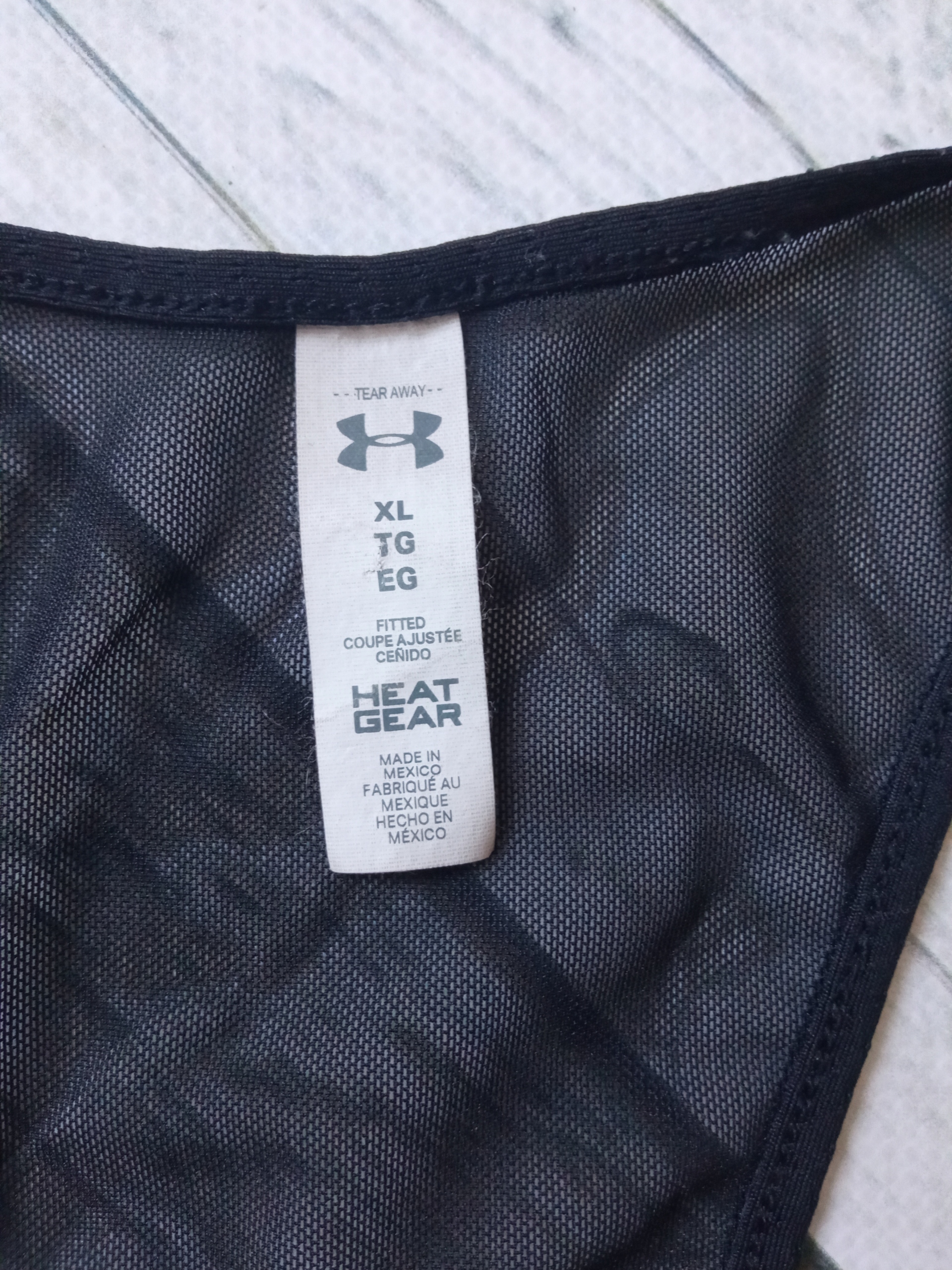 DAMSKA KOSZULKA SPORTOWA UNDER ARMOUR Dekolt okrągły