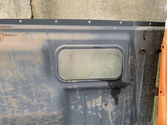 FORD TRANSIT MK7 SZYBA W ŚCIANĘ GRODZIOWĄ 2012