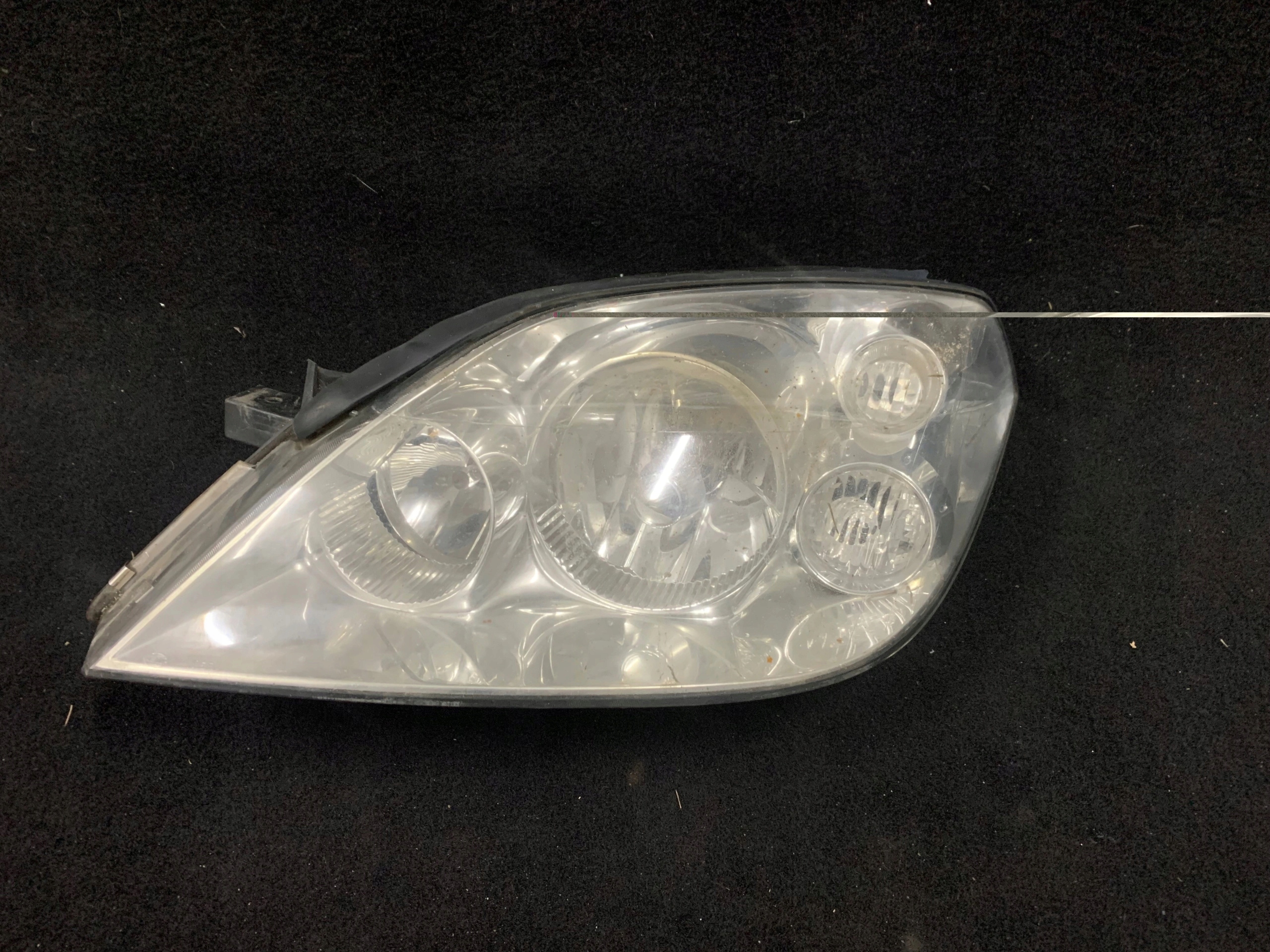 Lampa lewa przód xenon Nissan Primera P12 26060AU810